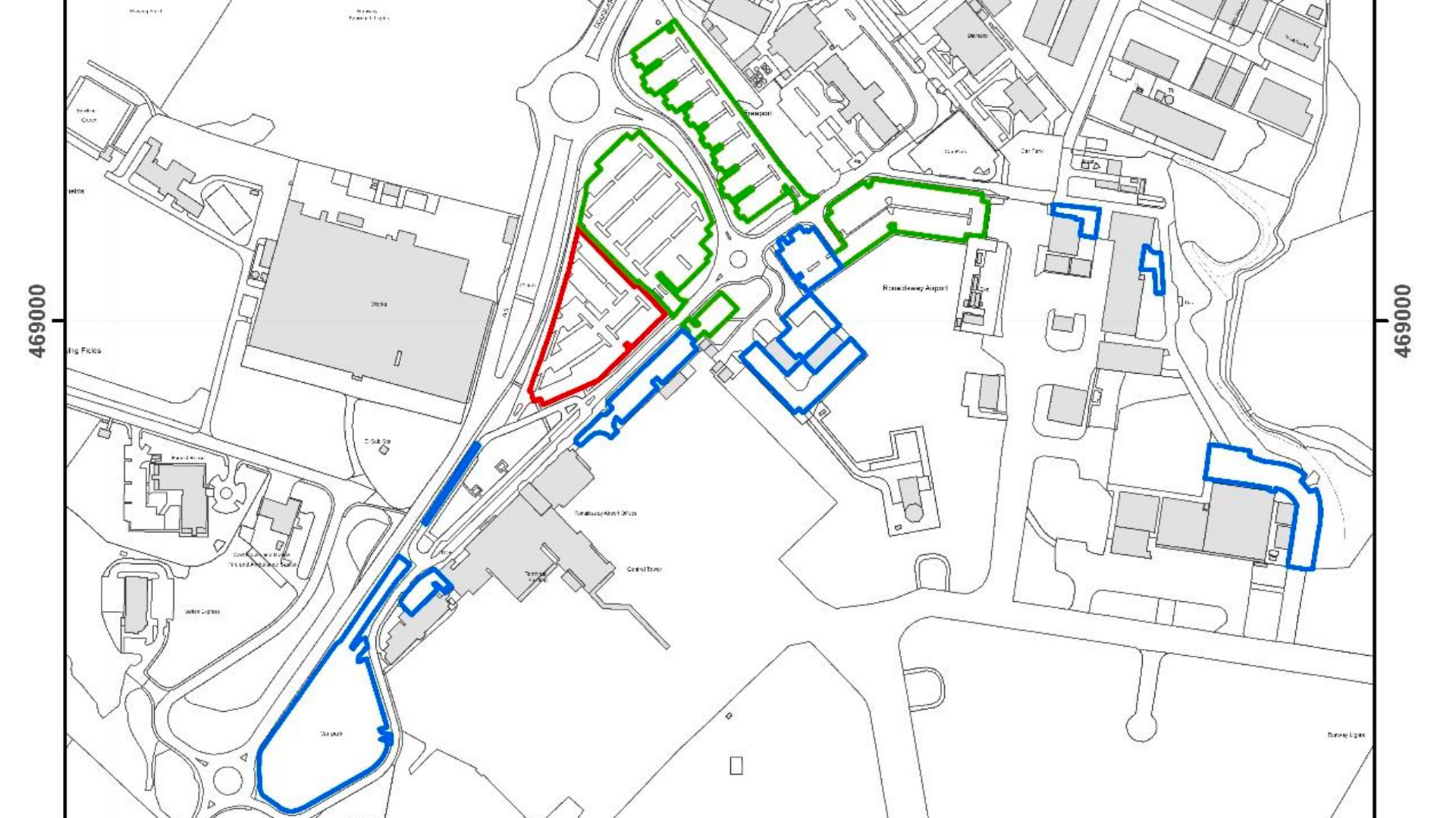 A map of Ronaldsway thhat outlines the parking areas. On the left of the site and right of the airport are blue areas, which designates private parking, a smaller red area is in front of the building and a larger green area is diagonally right.