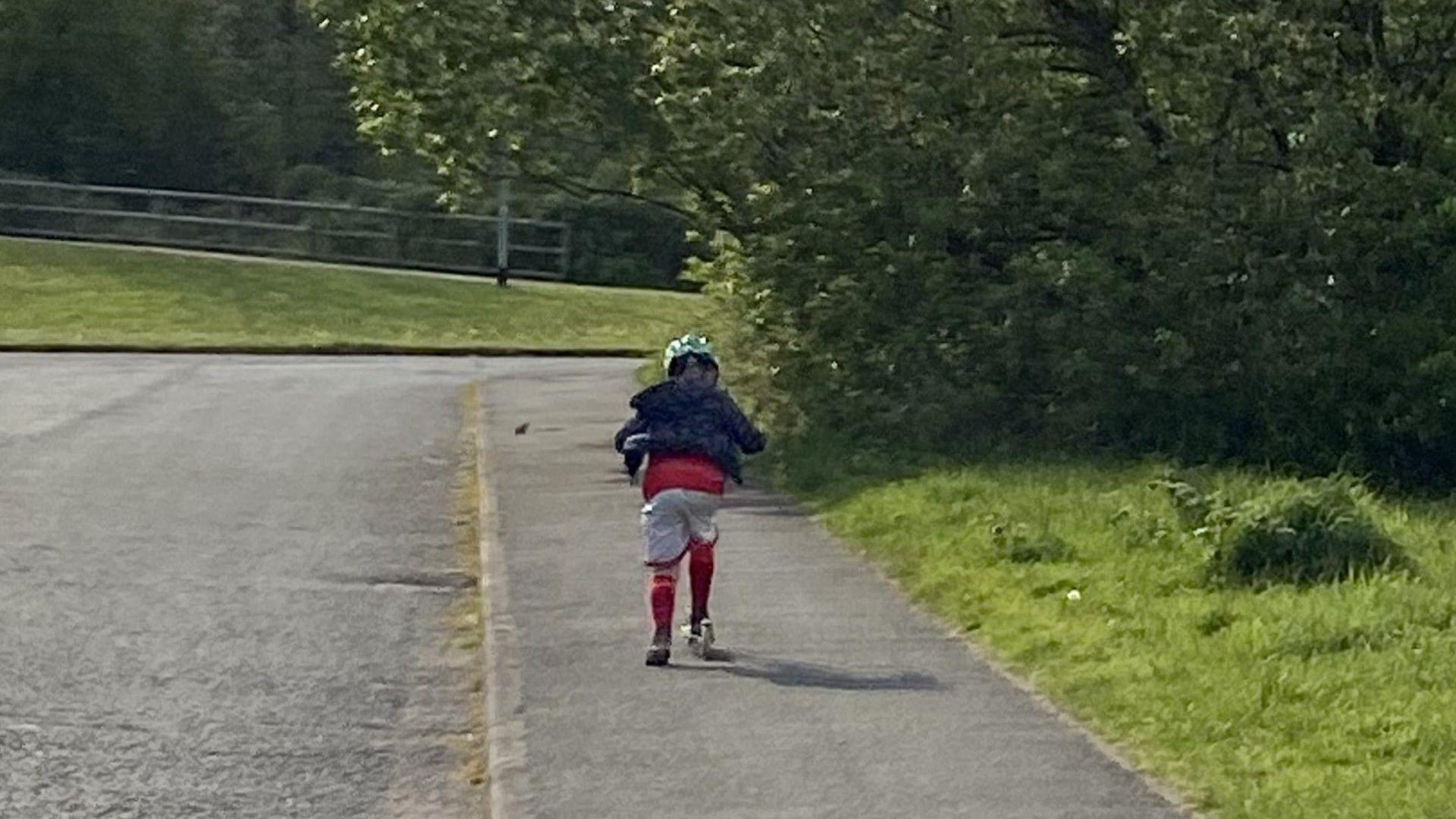 Isaac on his scooter