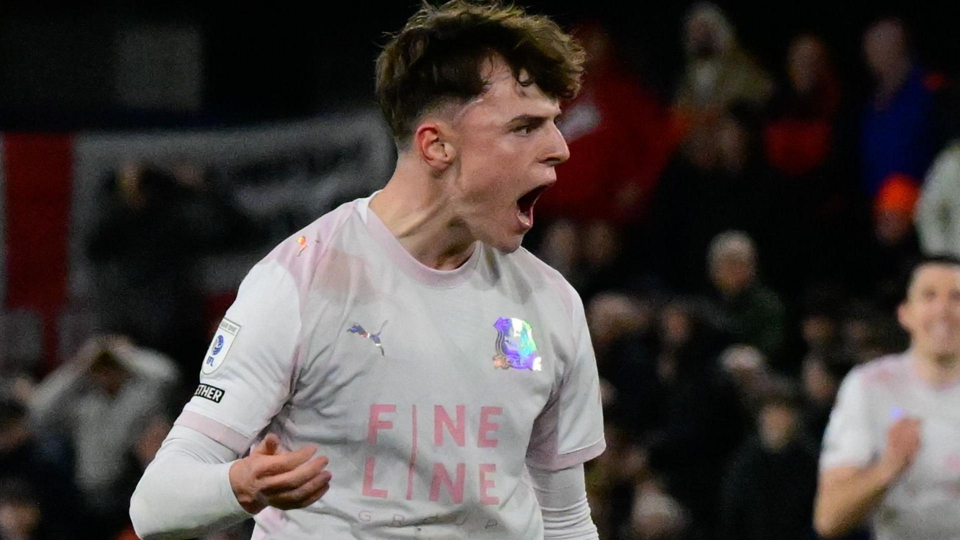 Tegan Finn celebrates scoring for Plymouth Argyle