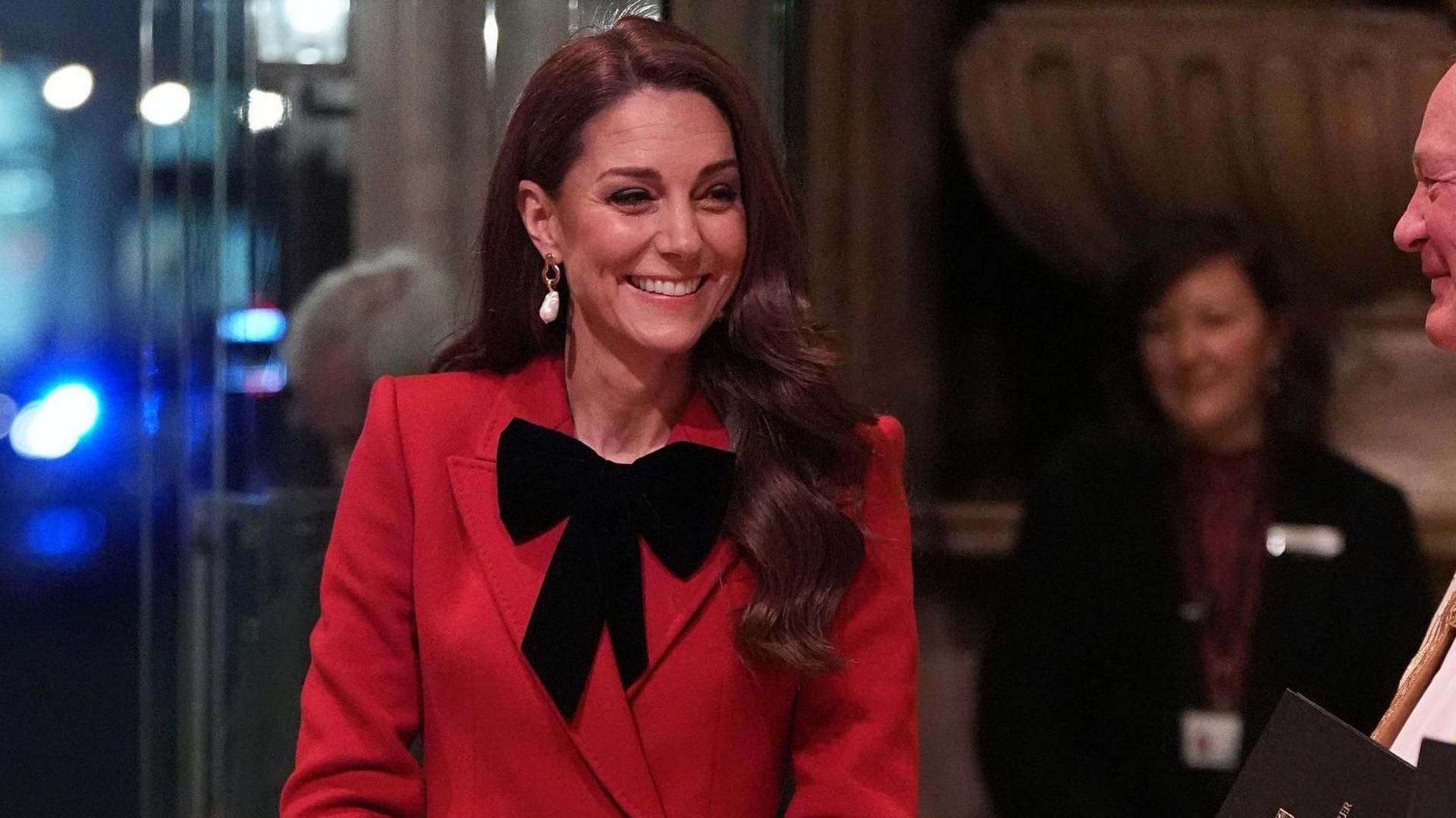 Kate smiling as she enters the event at Westminster Abbey