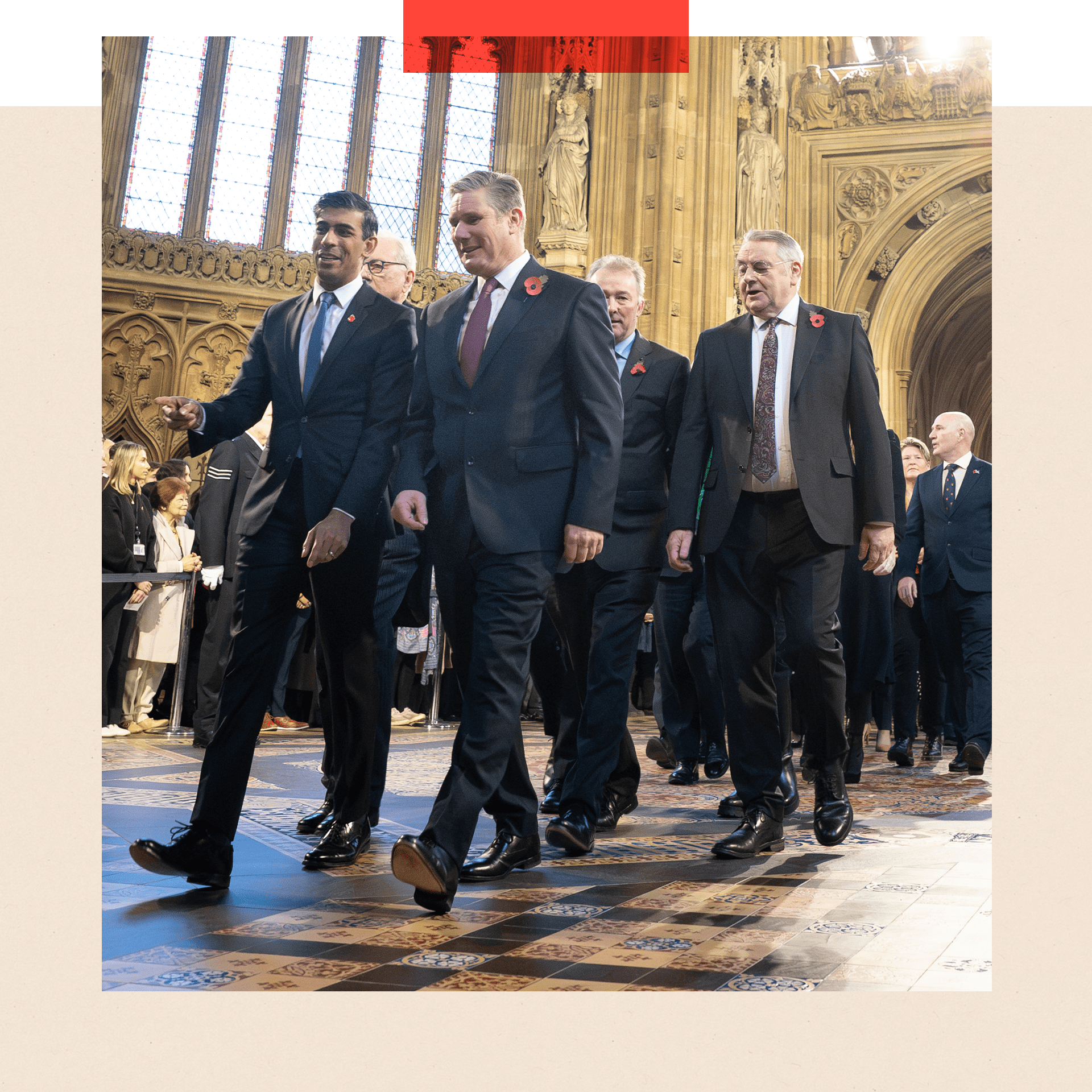 Then-Prime Minister Rishi Sunak and Labour leader Sir Keir Starmer lead MPs through the Central Lobby at the Palace of Westminster ahead of the State Opening of Parliament in November 2023