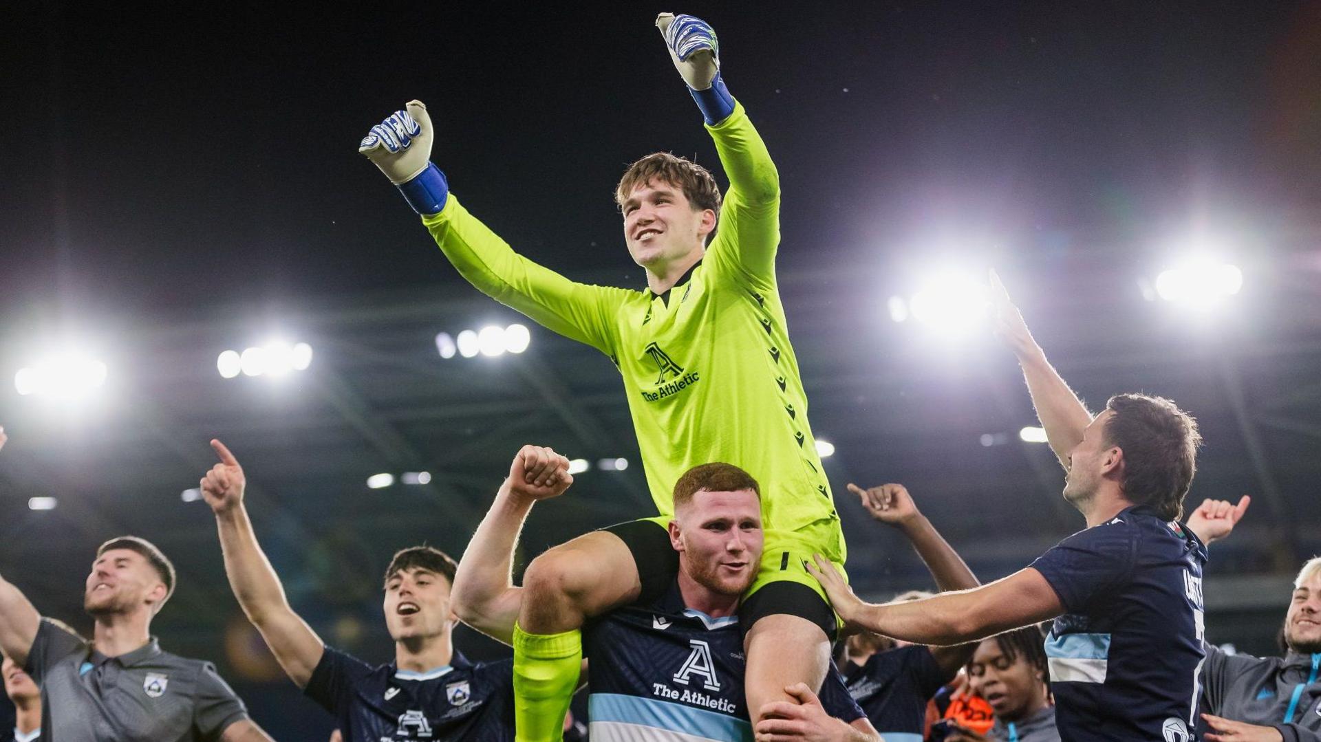 Goalkeeper Zak Jones leads the celebrations after Haverfordwest's Europa Conference League win over Shkendija in 2023