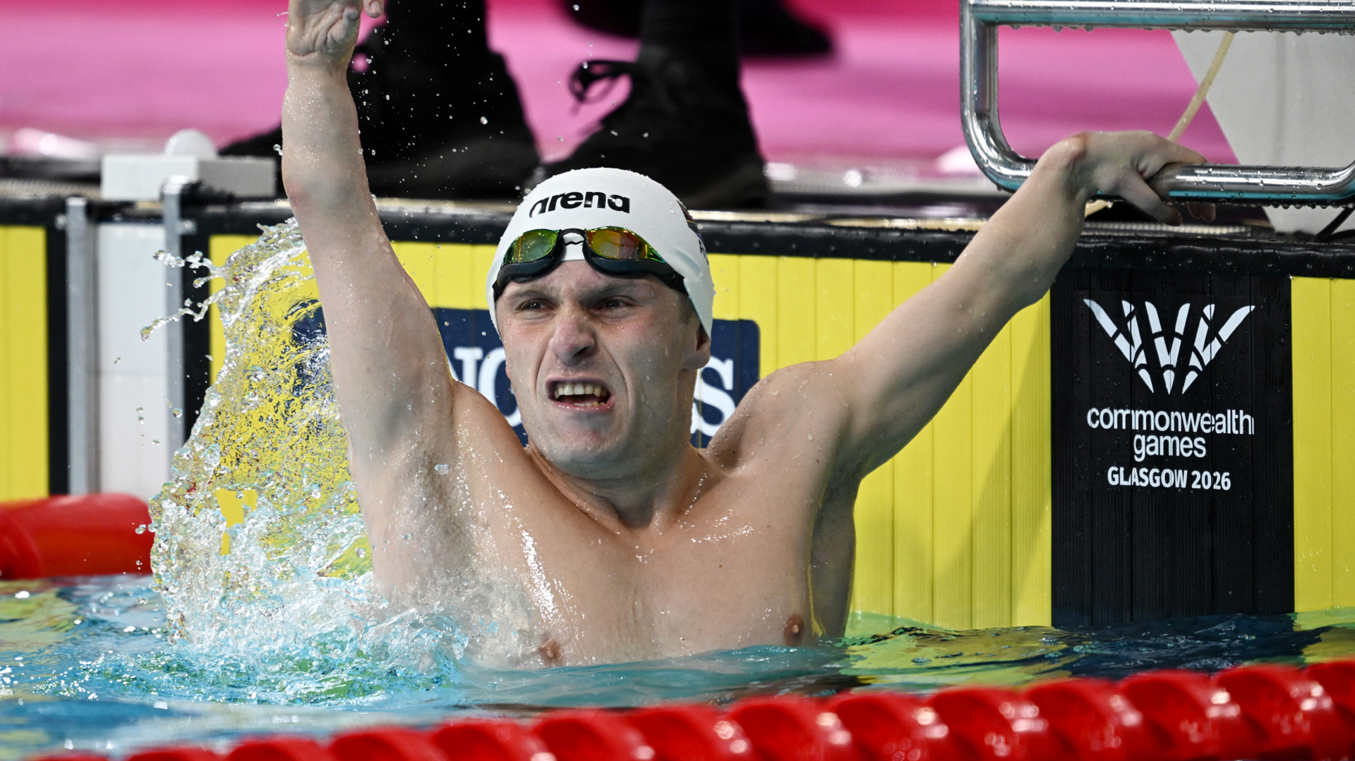 Christian Sadie of Team South Africa celebrates after winning the gold medal during the Men's 50m Freestyle S7 Final on day six of the Glasgow 2026 Commonwealth Games