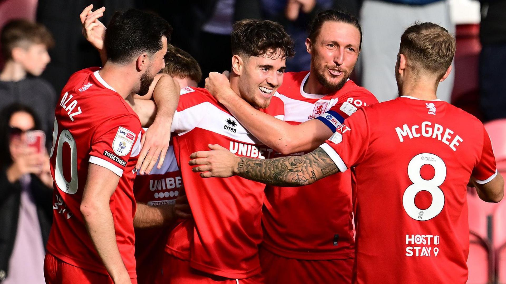 Hayden Hackney celebrating his goal with teammates