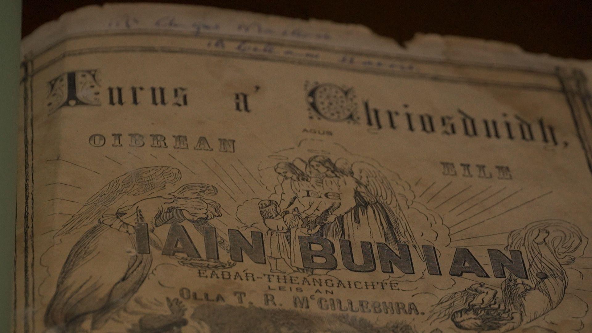 Prìomh dhuilleag an leabhair le ainm Iain Bunian air