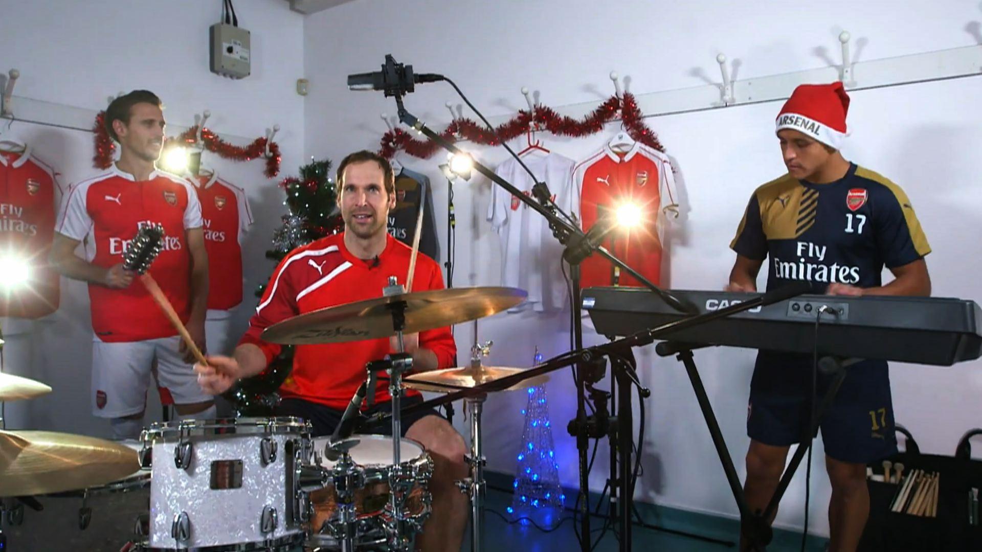 Arsenal stars Petr Cech, Alexis Sanchez and Nacho Monreal show off their musical skills by playing a Christmas song to raise money for the club's Arsenal Foundation
