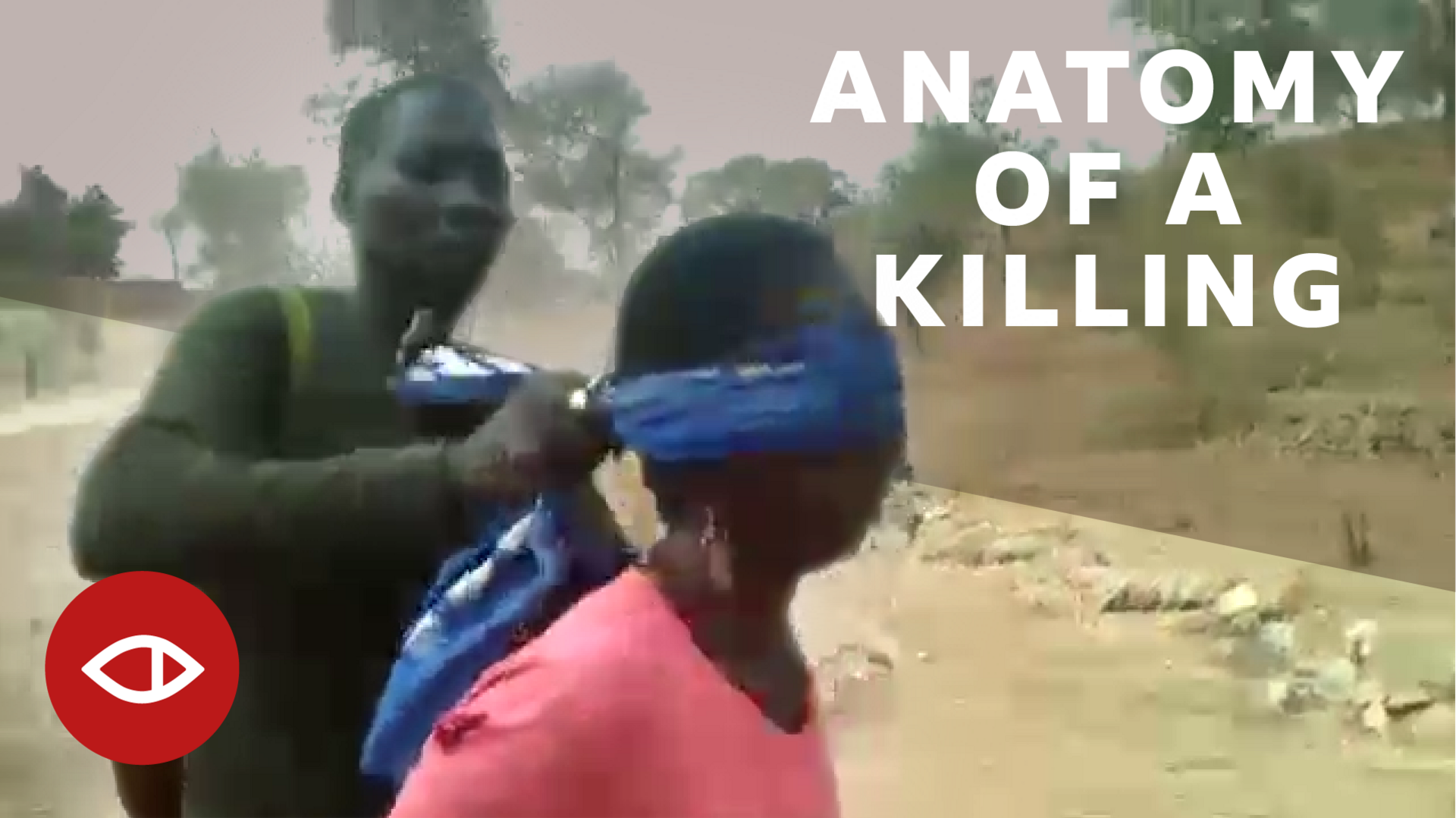 A woman is blindfolded by a Cameroonian soldier.