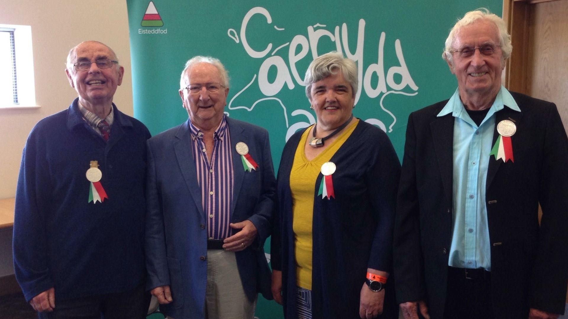 Llywyddion anrhydeddus ⁦Eisteddfod yr Urdd 2019: Gwilym Roberts, Emyr Edwards, Gaynor Jones ac Alun Guy.