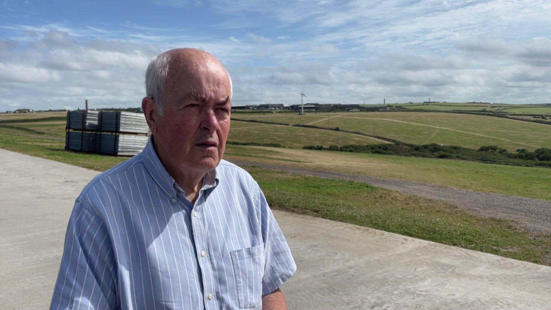 Councillor John Fitter standing on the festival site