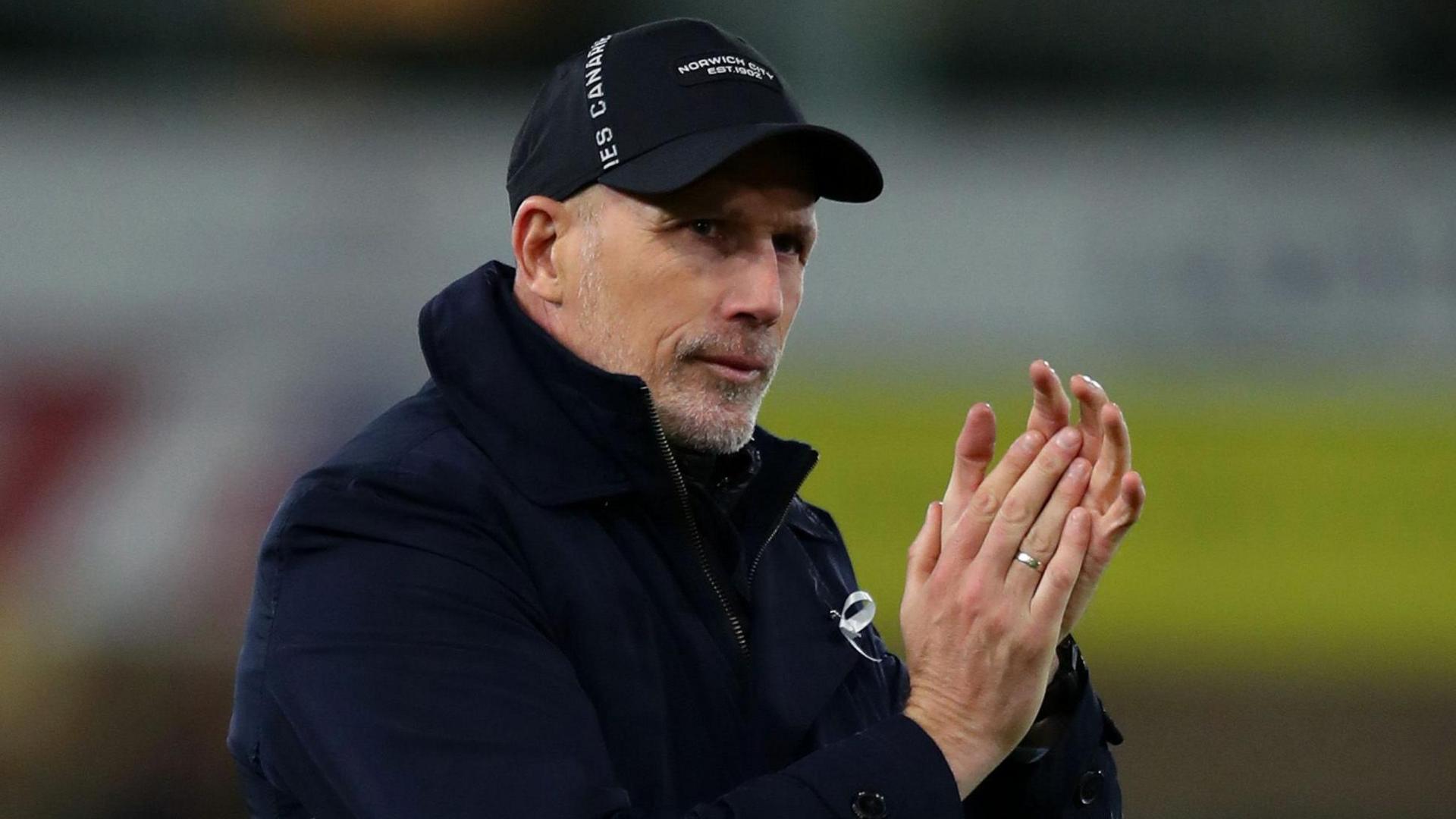 Philippe Clement applauds the Norwich fans
