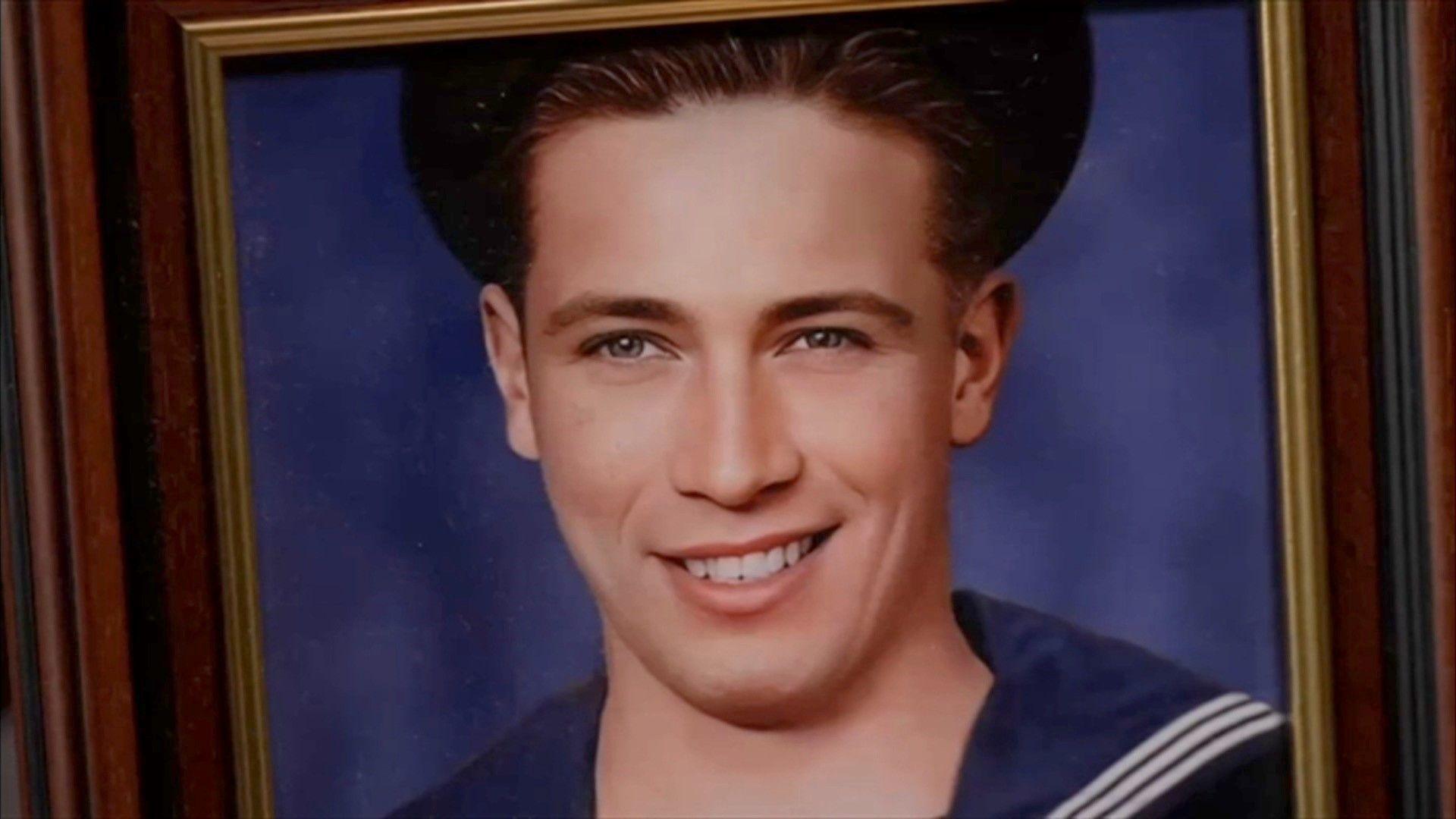 A head shot of Ralph McClure when he was young wearing his navy uniform.