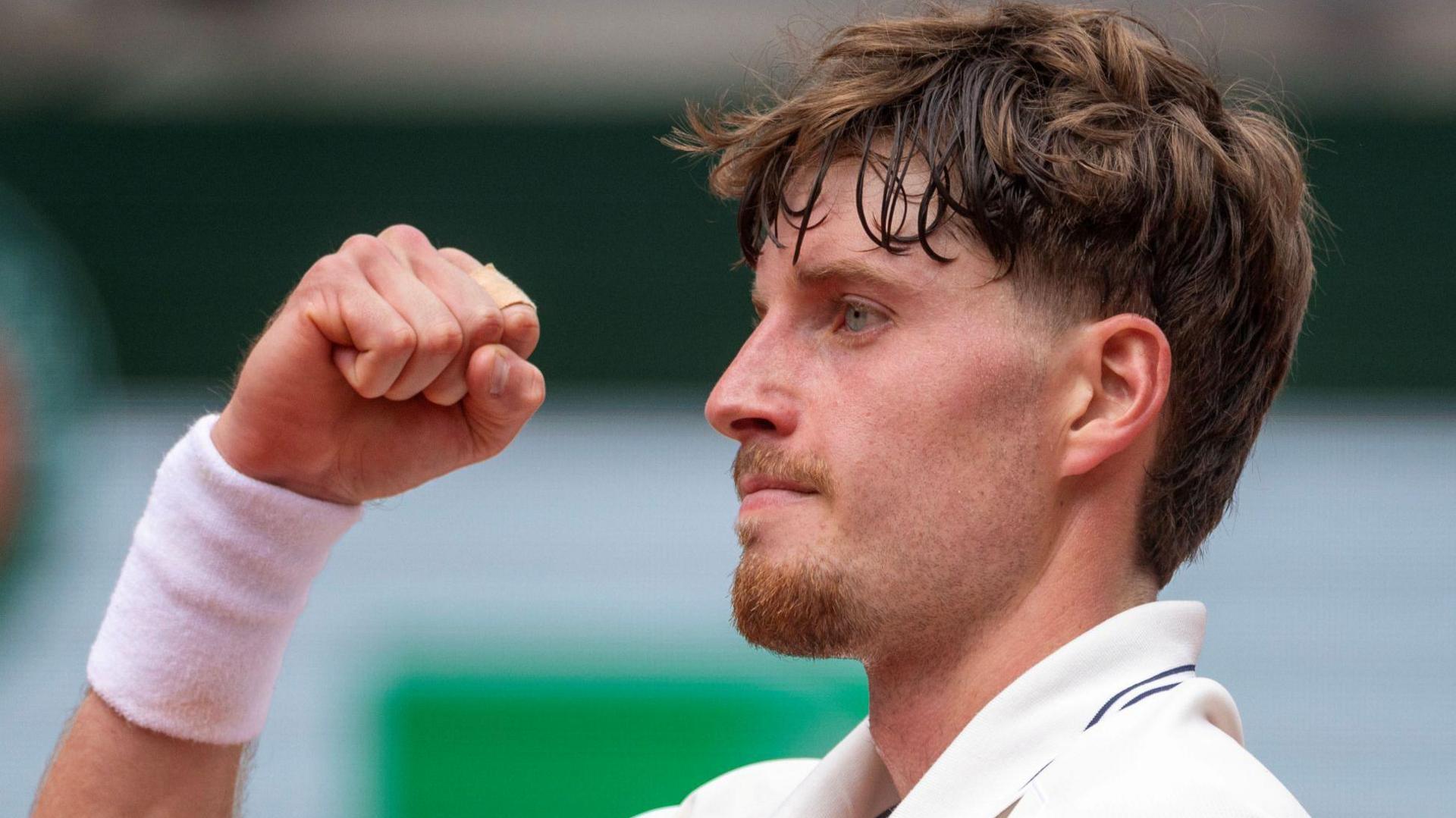 Great Britain's Toby Samuel celebrates winning in French Open qualifying