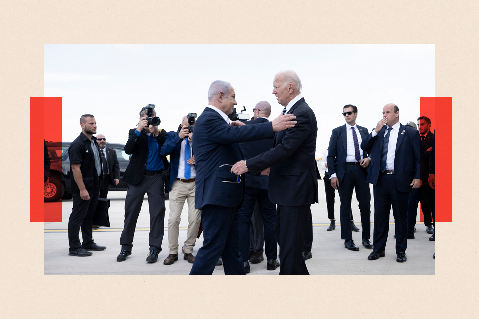 Benjamin Netanyahu (L) greets US President Joe Biden upon his arrival at Tel Aviv's Ben Gurion airport 