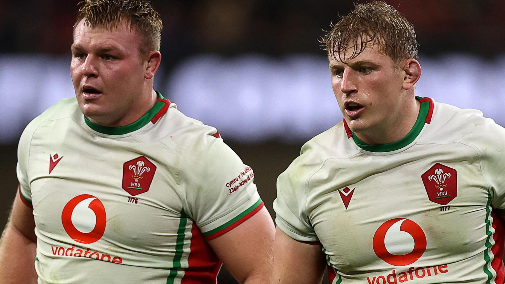 Dewi Lake and Jac Morgan stand together in the white jerseys of Wales