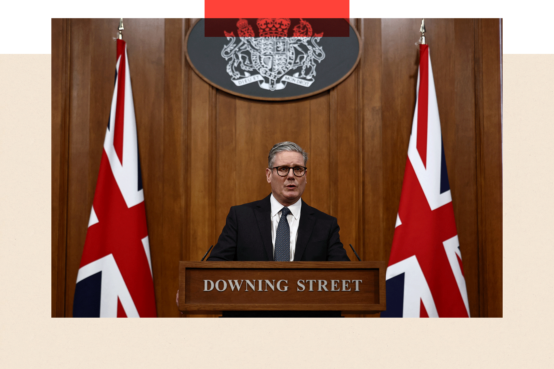 Starmer at a Downing Street podium giving a speech 