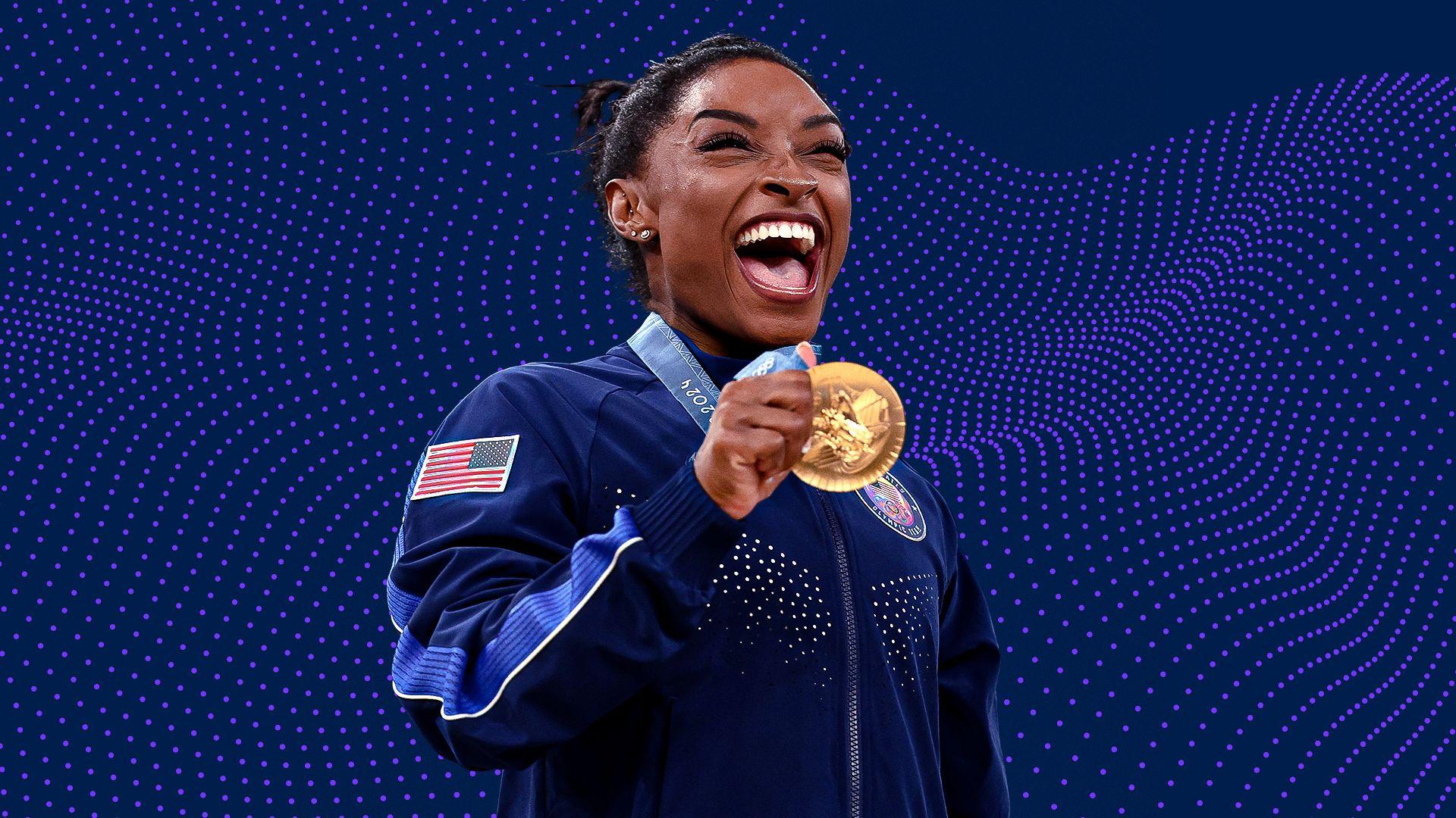 Simone Biles celebrates winning Olympic gold