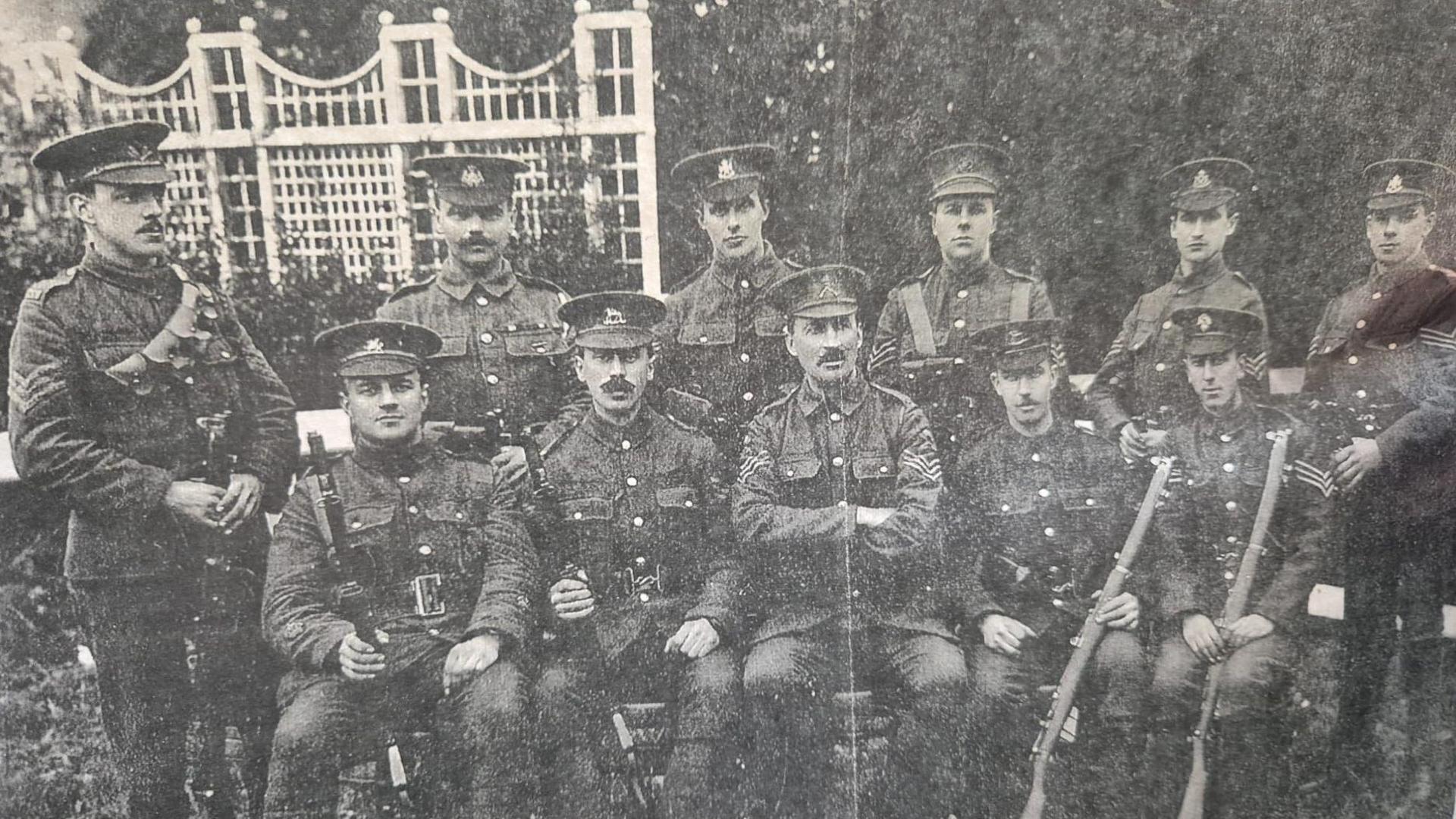 A black and white photograph of First World War era soldiers in full kit