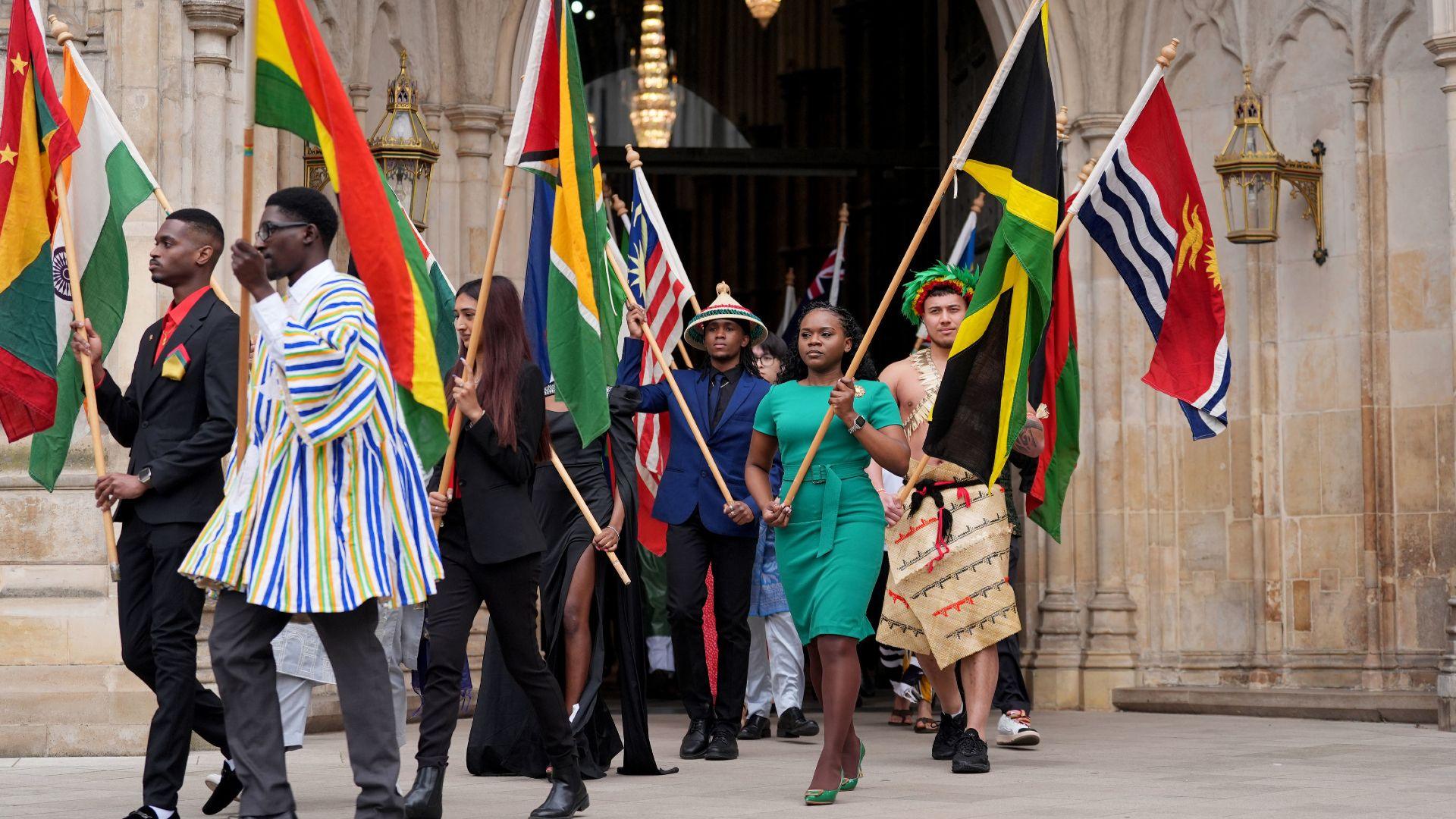 Flag bearers leave after attending the annual Commonwealth Day Service.