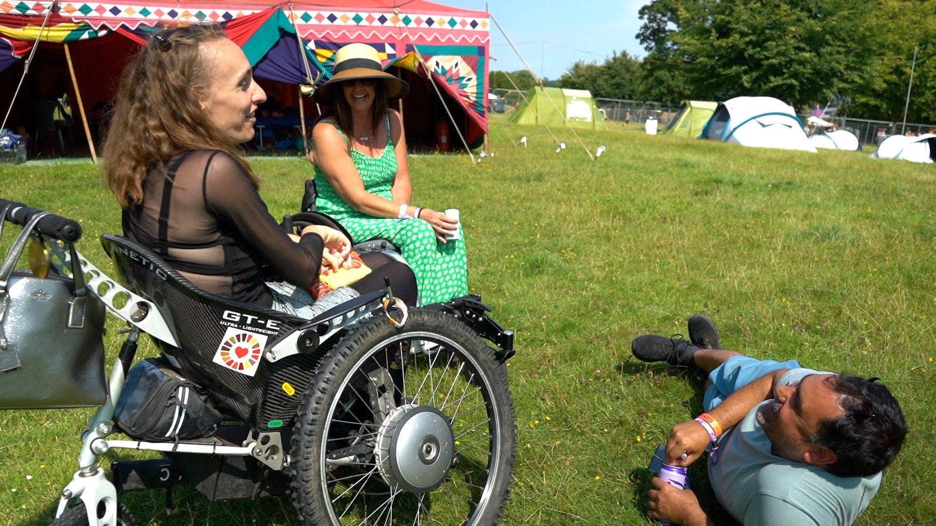 Lucy relaxing at the Festival with her two friends