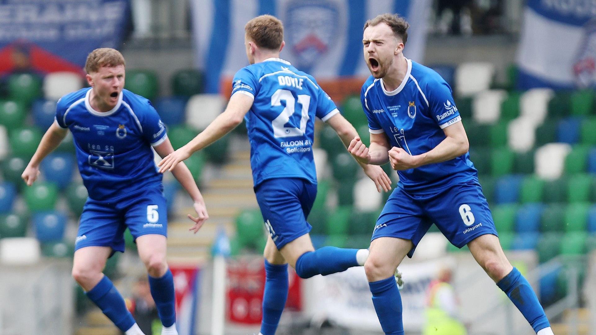 Dungannon players celebrate