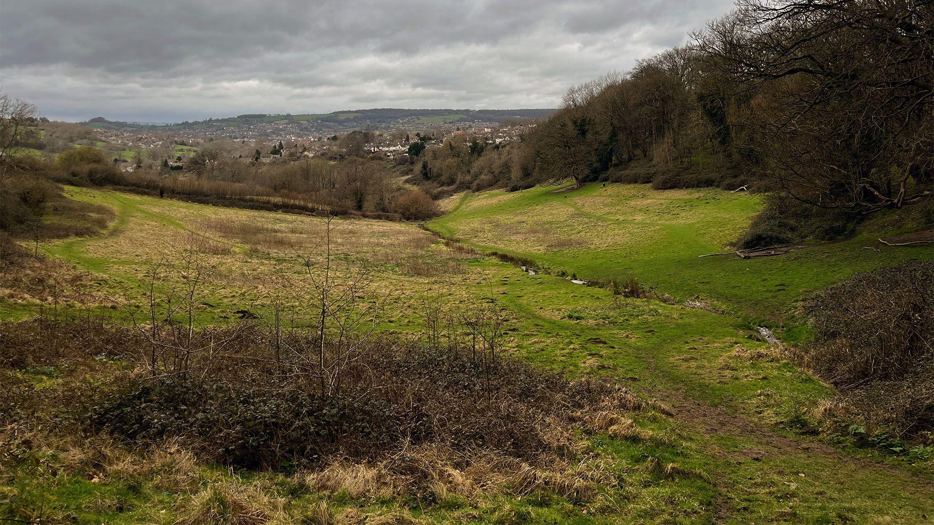 A valley with the town of Stroud in the background.