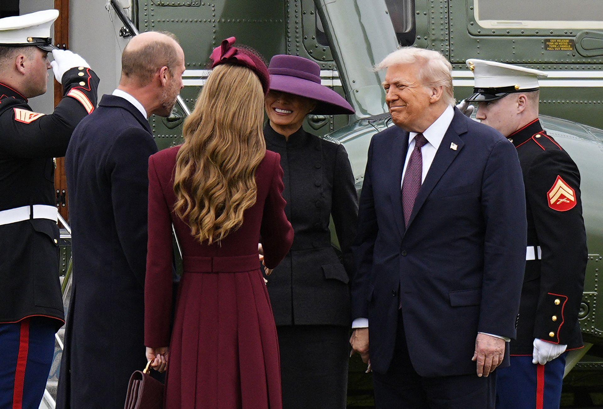 US President Donald Trump and First Lady Melania Trump are greeted by Britain's Prince William, Prince of Wales and Britain's Catherine, Princess of Wales, upon their arrival at the grounds of Windsor Castle, in Windsor, on September 17, 2025, for the start of a second State Visit.          