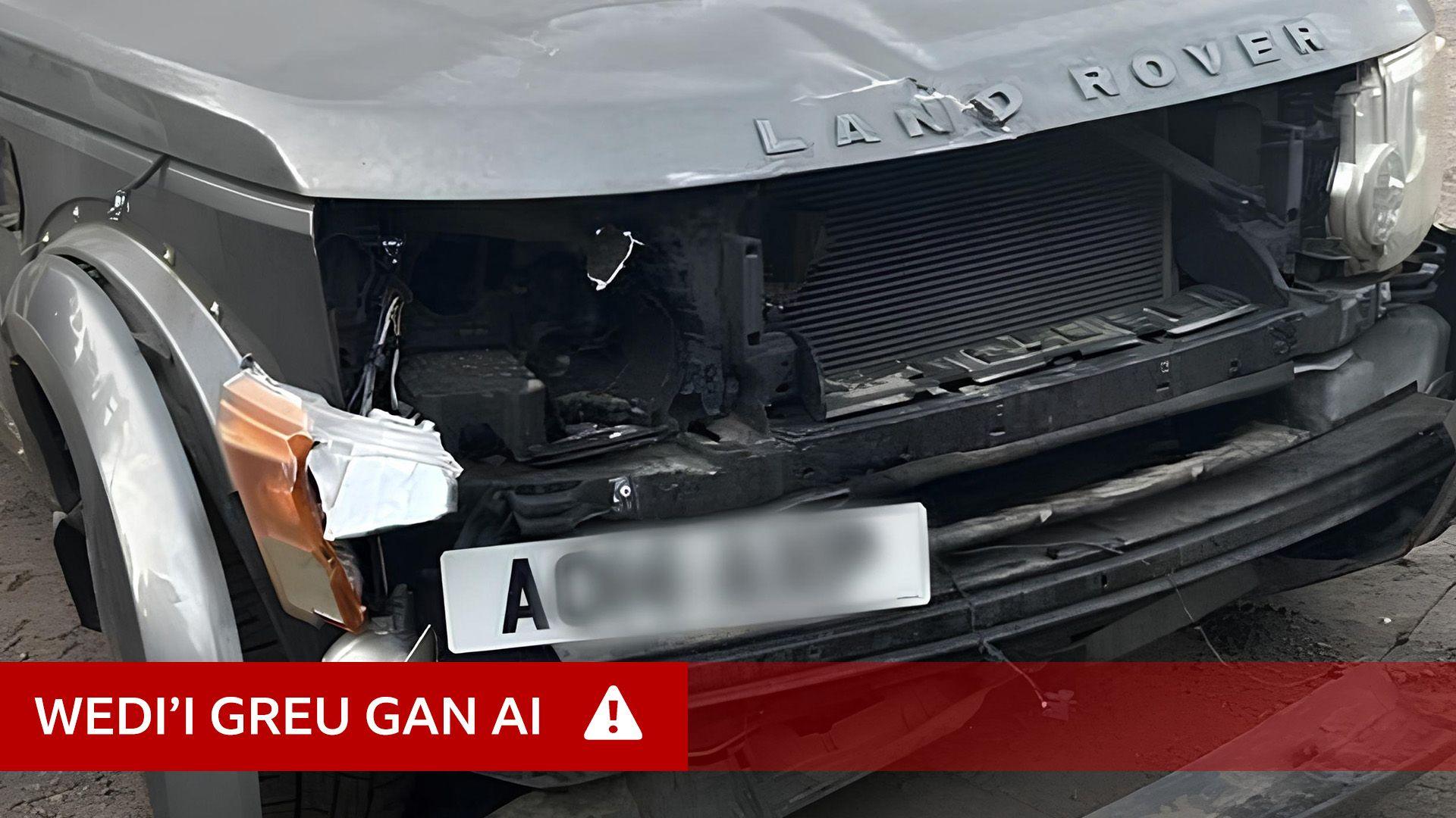 Difrod i gar, wedi'i greu gan AI