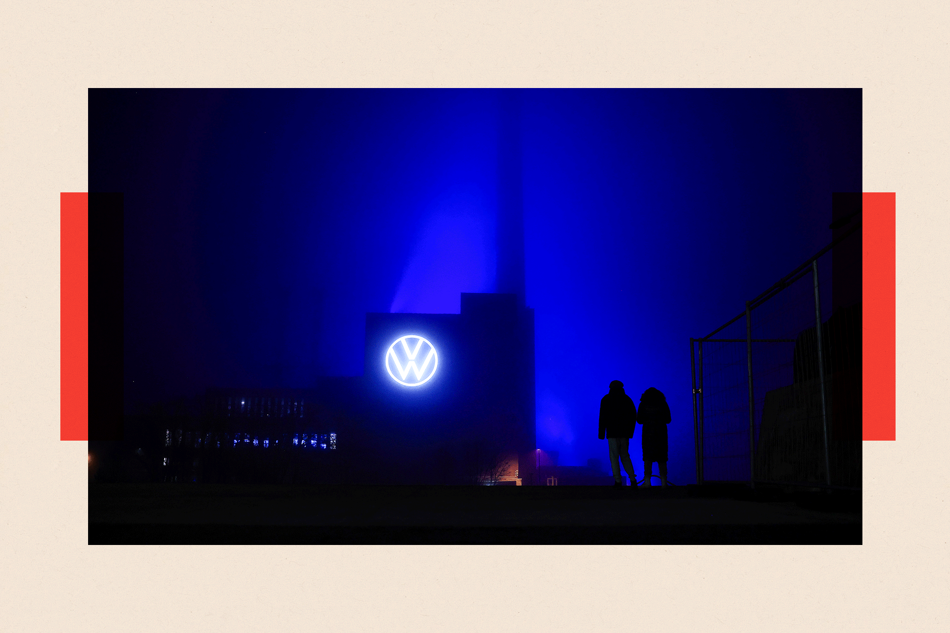 The Volkswagen AG factory at dusk lit in a blue light, in Wolfsburg, Germany
