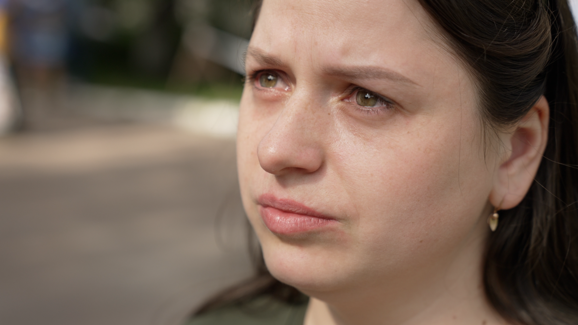 One of the relatives of missing Ukrainian soldiers with tears in her eyes