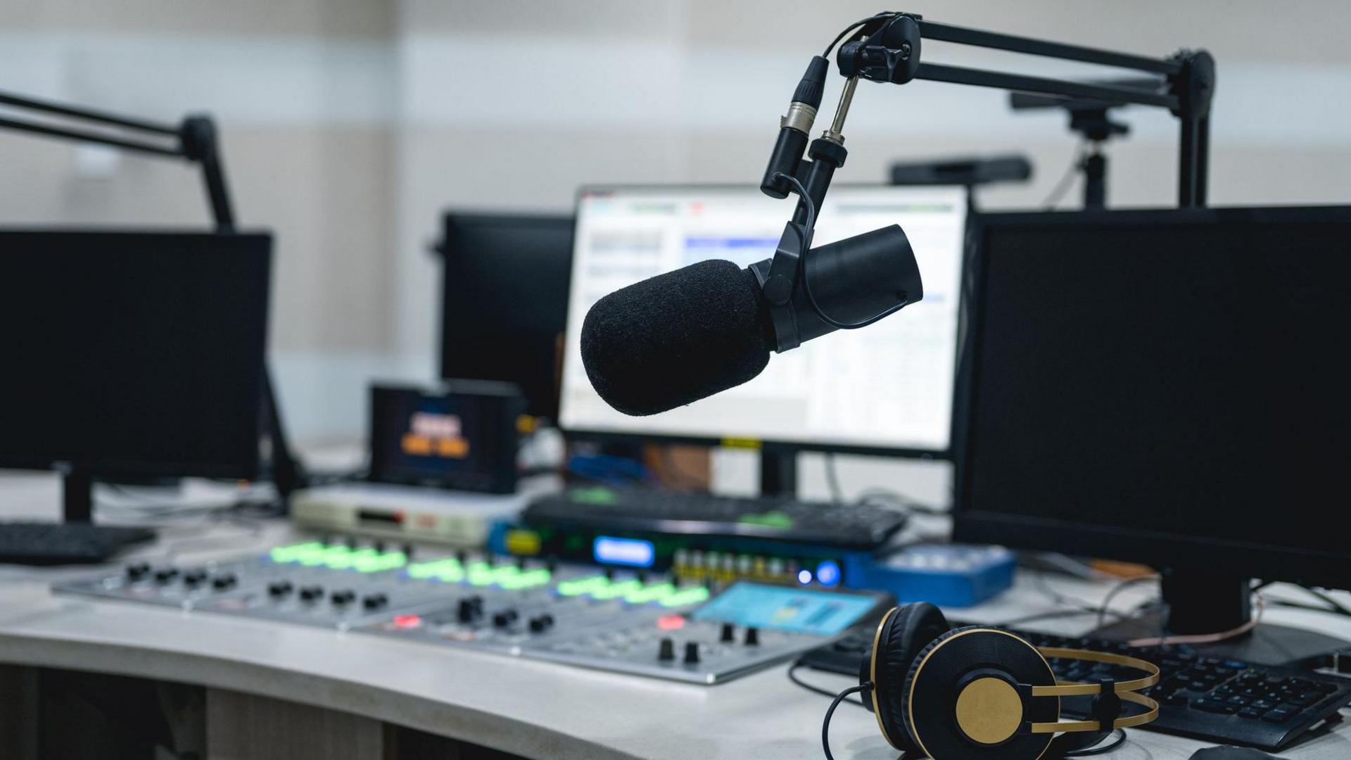 Media equipment in the live room of a radio station - stock photo