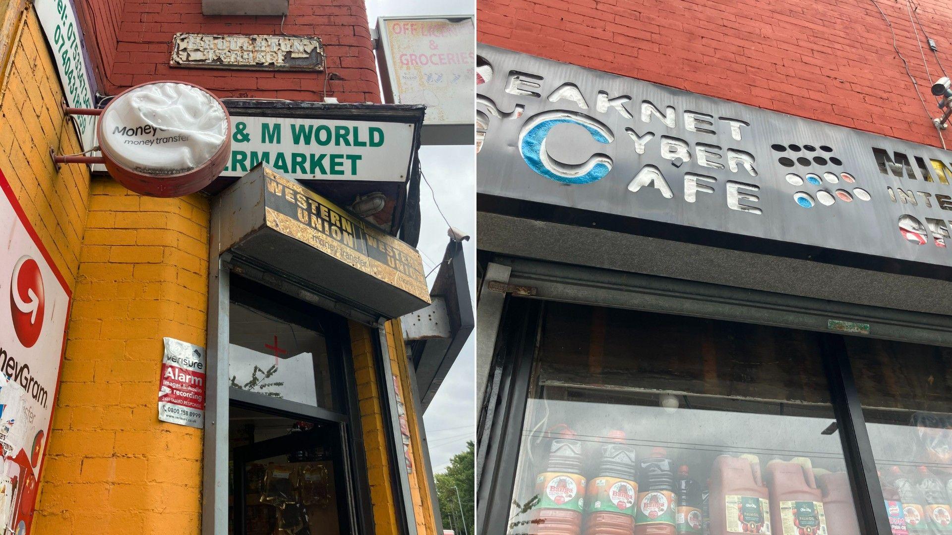 Fire-damaged signs above a shop.