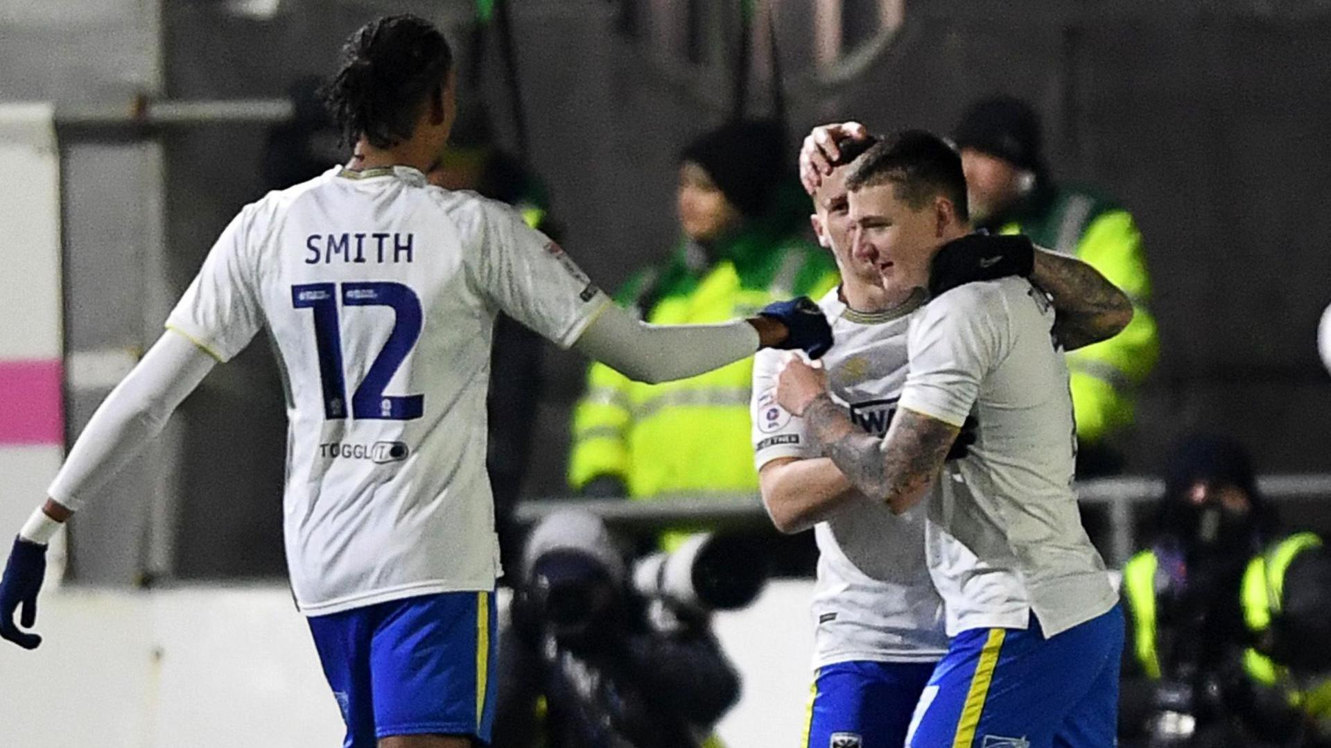 AFC Wimbledon celebrate Josh Kelly's opening goal