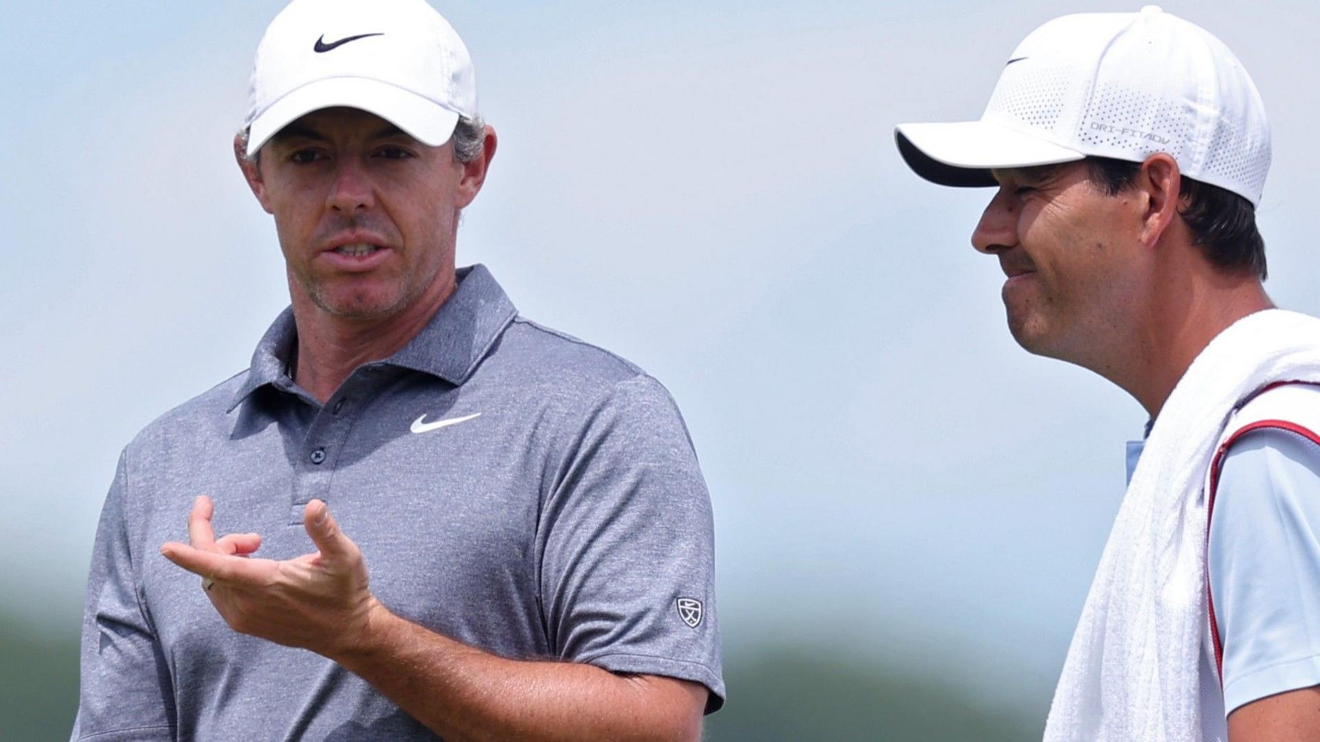 Rory McIlroy talking with his caddie Harry Diamond during round two of the US Open