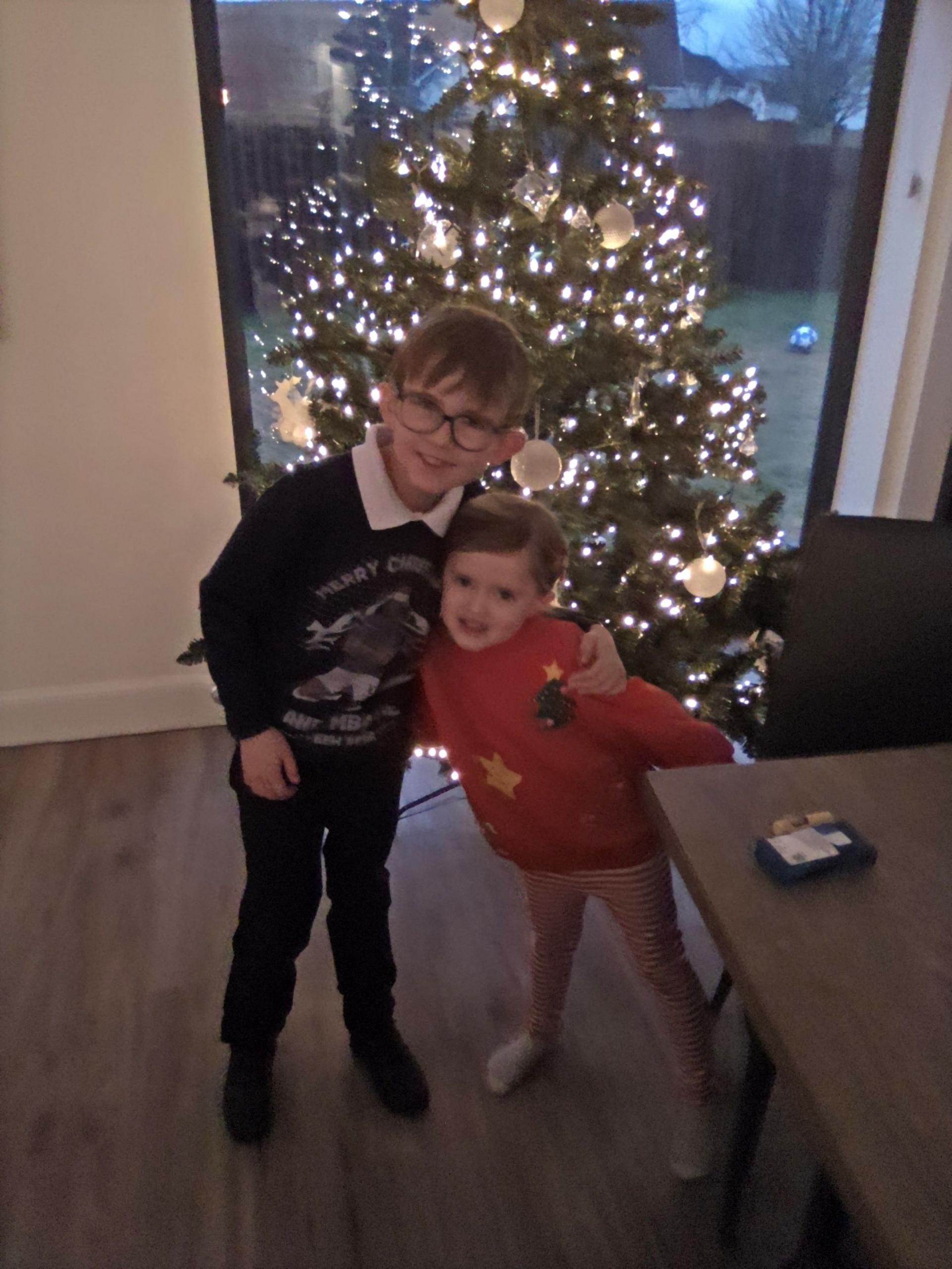 children in christmas jumpers