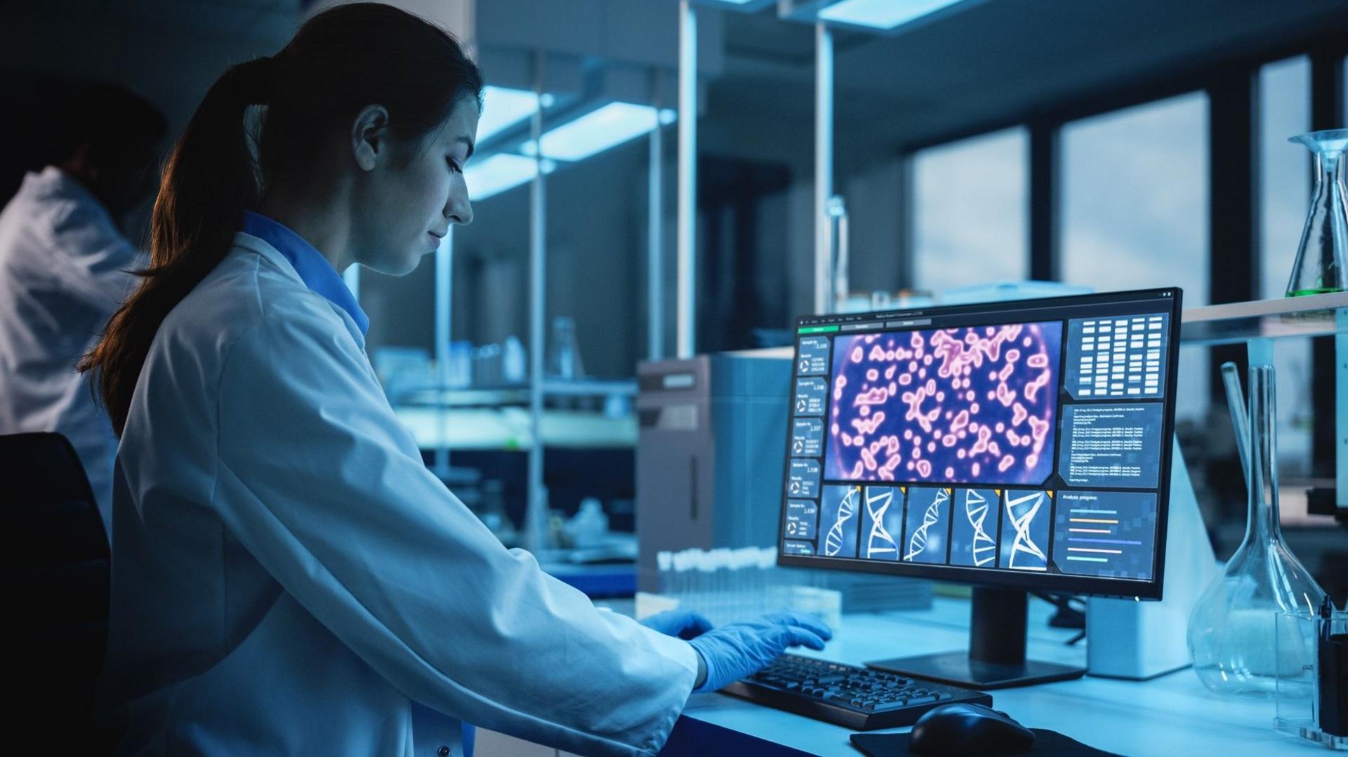 Female researcher works on a screen