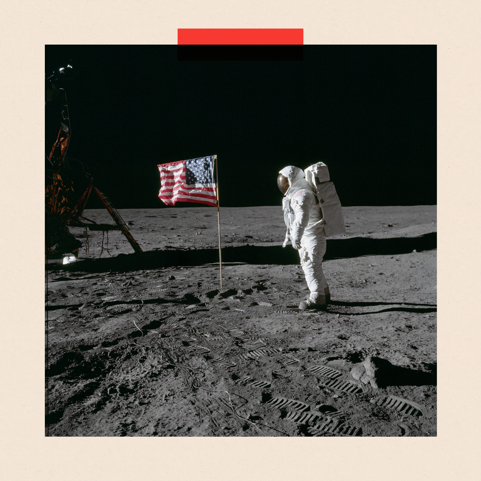 Astronaut Edwin Aldrin on the surface of the Moon next to the US flag