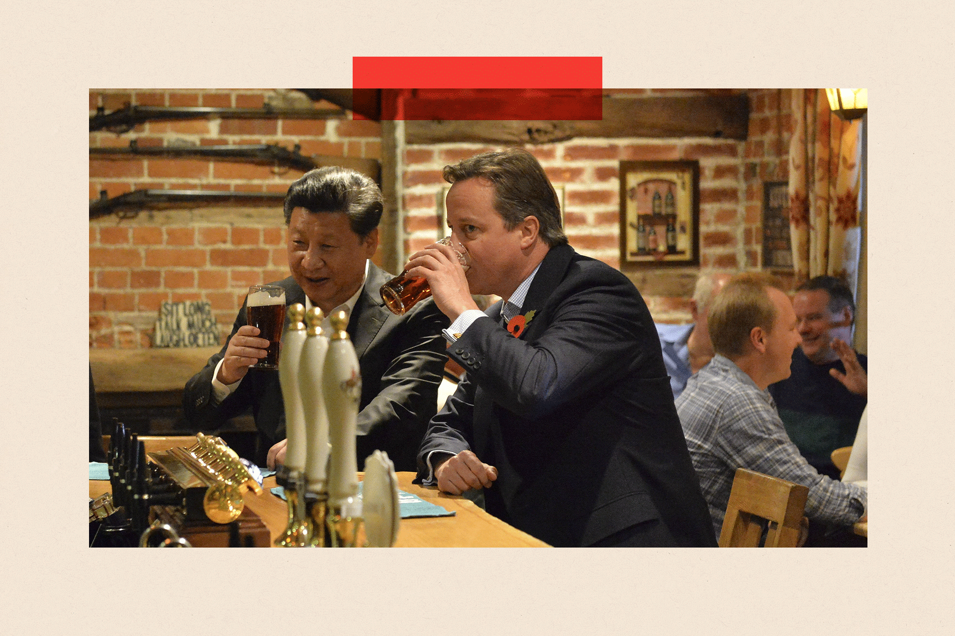 China's President Xi Jinping and Britain's former Prime Minister David Cameron share a pint at a pub