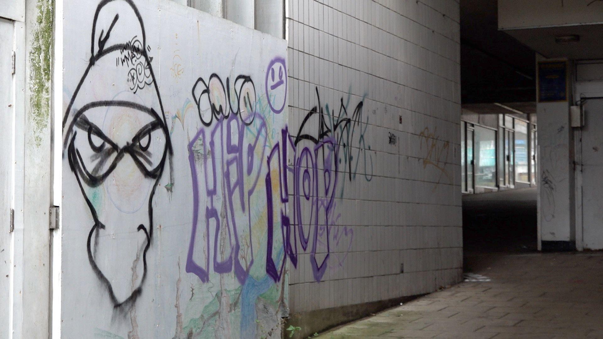 Grafitti on the walls of the derelict Crossways Shopping Centre in Paignton before it was demolished in April 2023