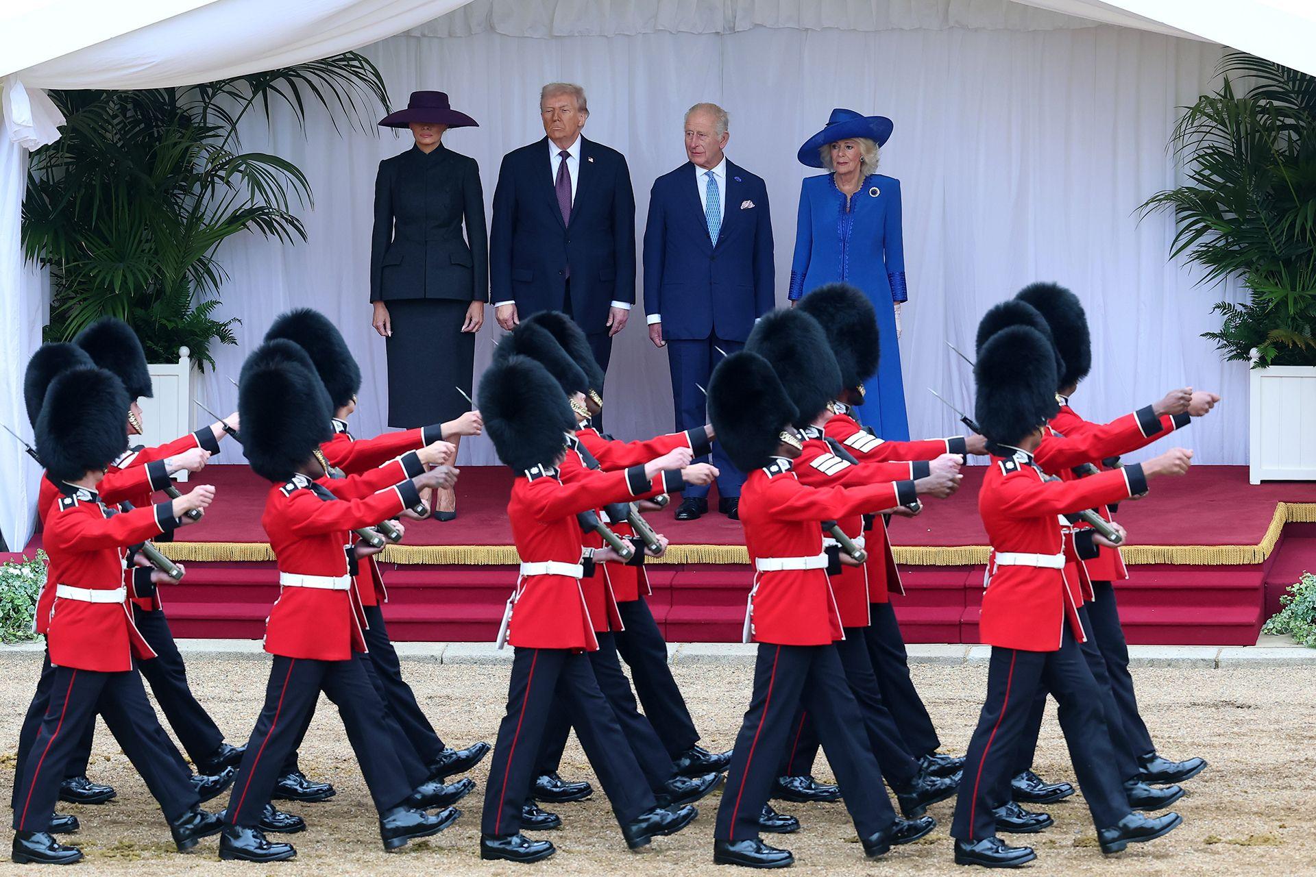 Charles III and Queen Camilla inspect the troops during the State visit by the President of the United States of America at Windsor Castle 