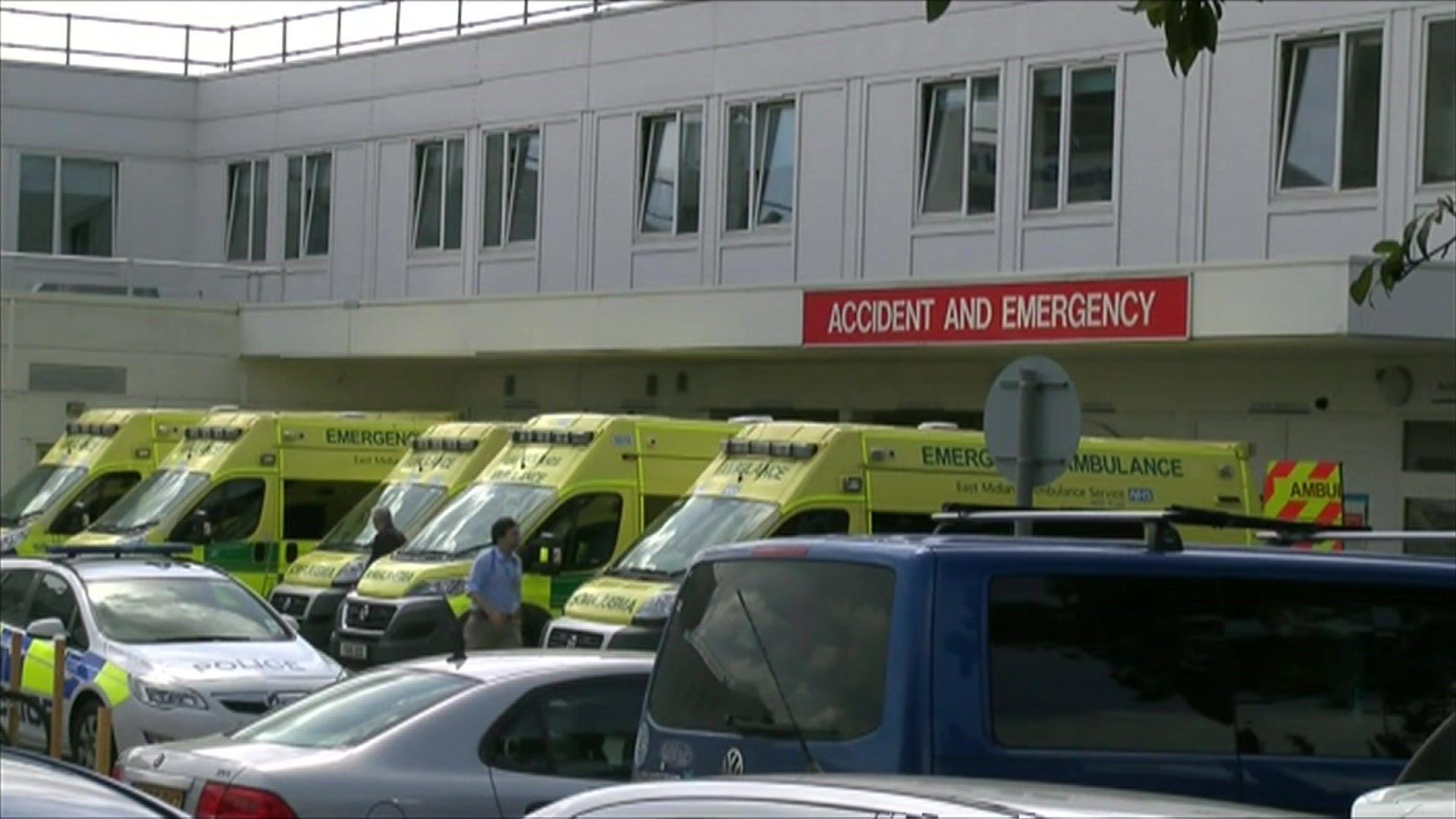 Ambulances lined up out a hospital's Accident and Emergency Department