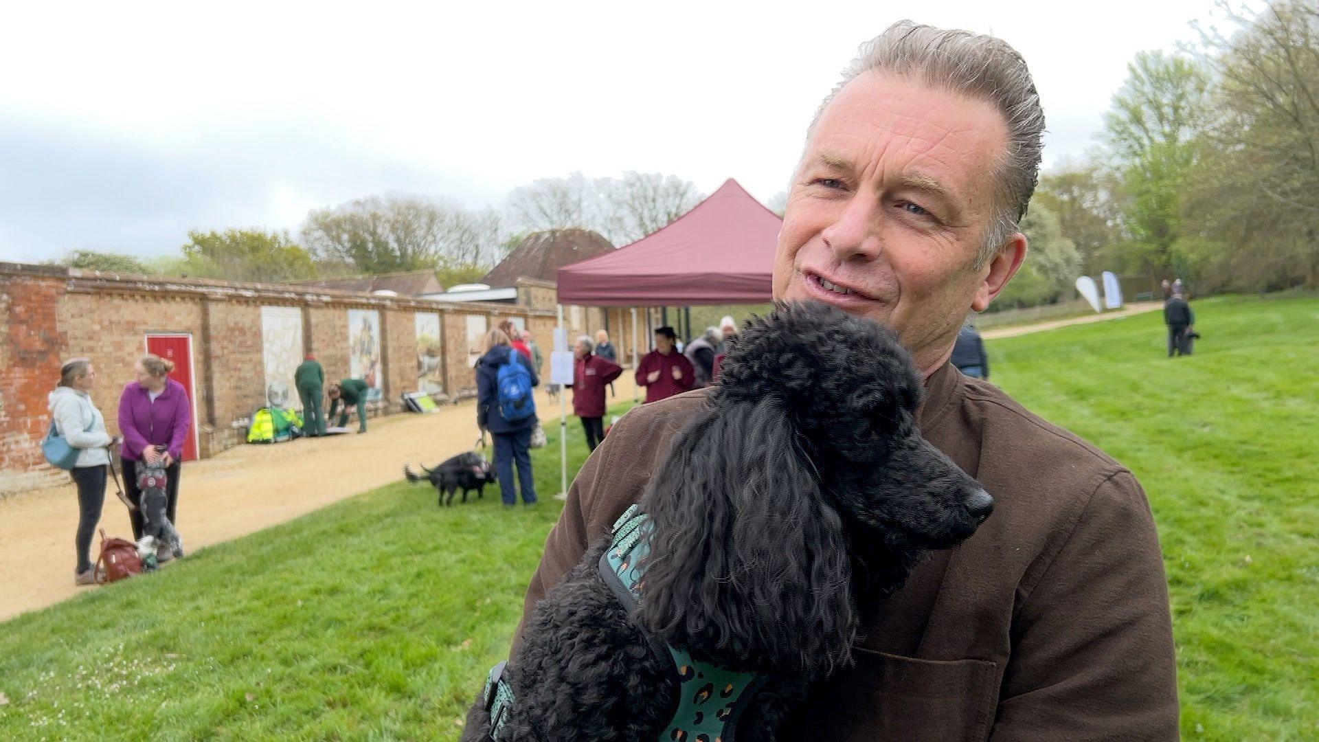 Chris Packham with his poodle, Nancy