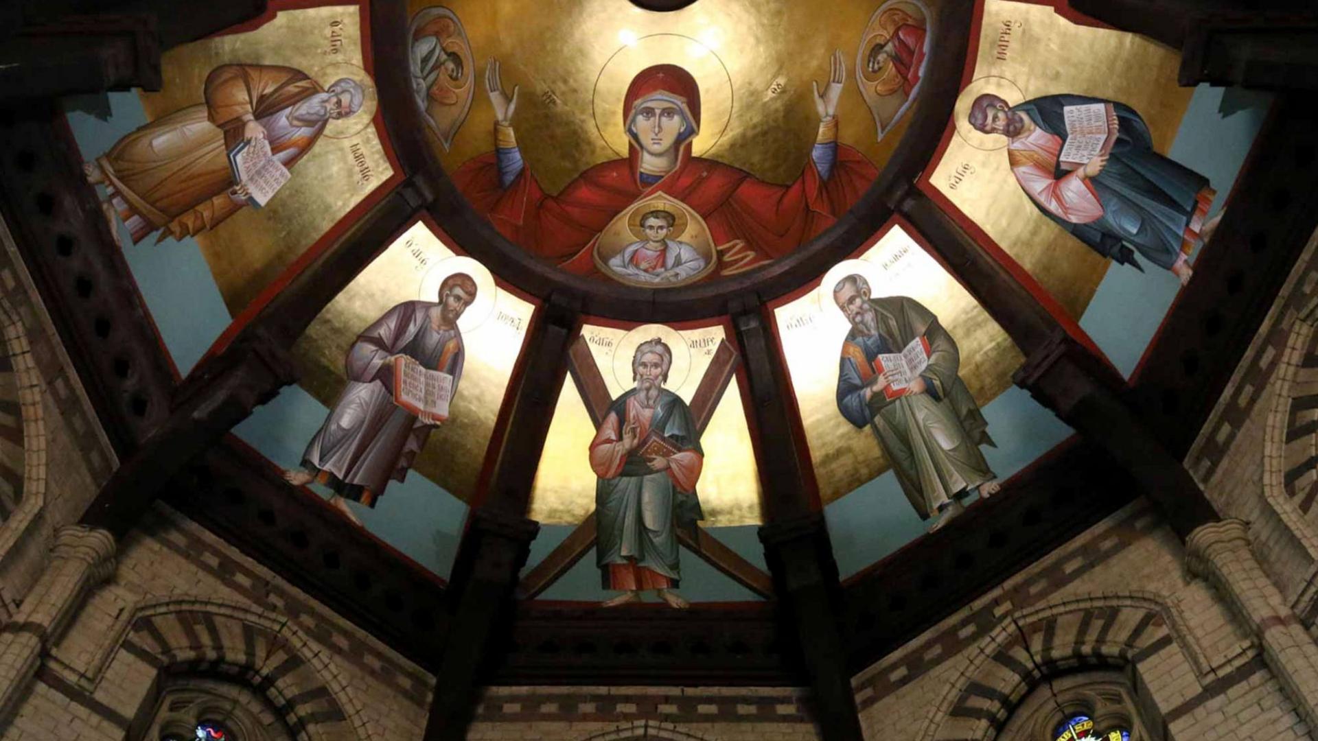 The painted roof inside a Greek Orthodox Church with six painted figures.