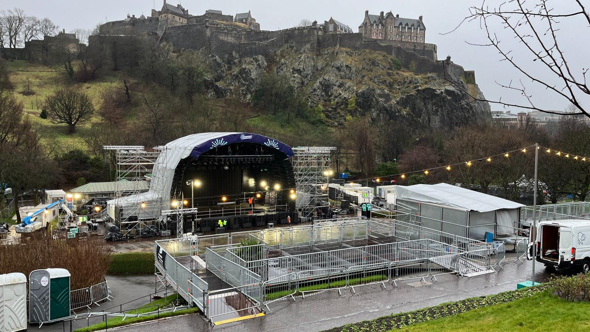 A stage with barriers in front of Edinburgh Castle