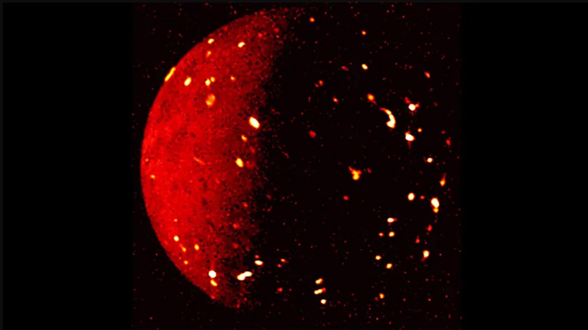 Infrared image of Io revealing volcanoes, lava flows and lava lakes