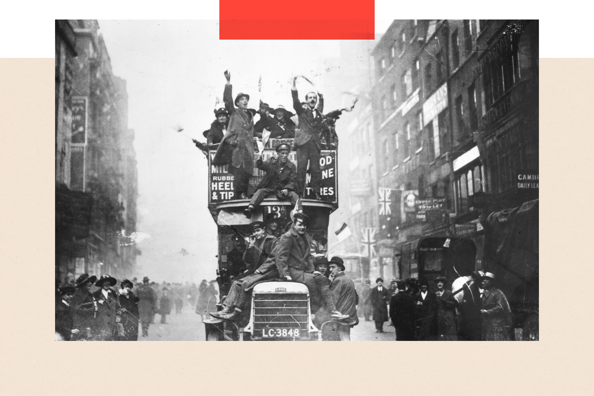 Crowds celebrating the signing of the Armistice at the end of World War I, UK, 11th November 1918