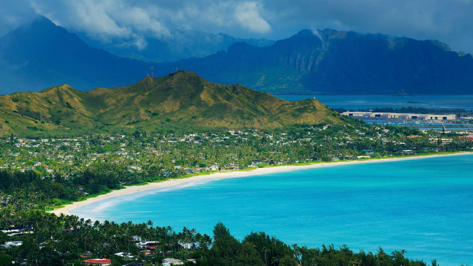 Hawaii beach with volcano in background