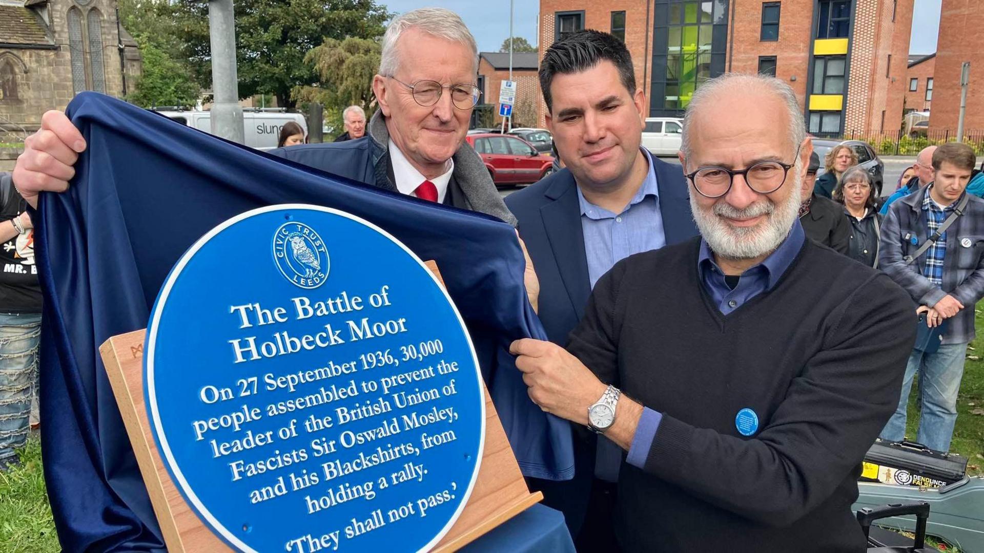 Leeds South MP Hilary Benn, Leeds East MP Richard Burgon and Leeds North East MP Fabian Hamilton unveil the blue plaque