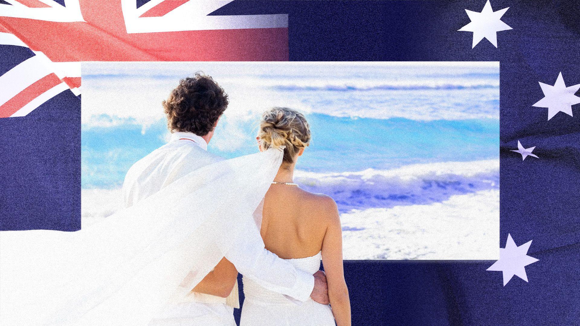 A newlywed couple are seen looking out to sea on a beach, with a photo of the Australian flag in the background. 