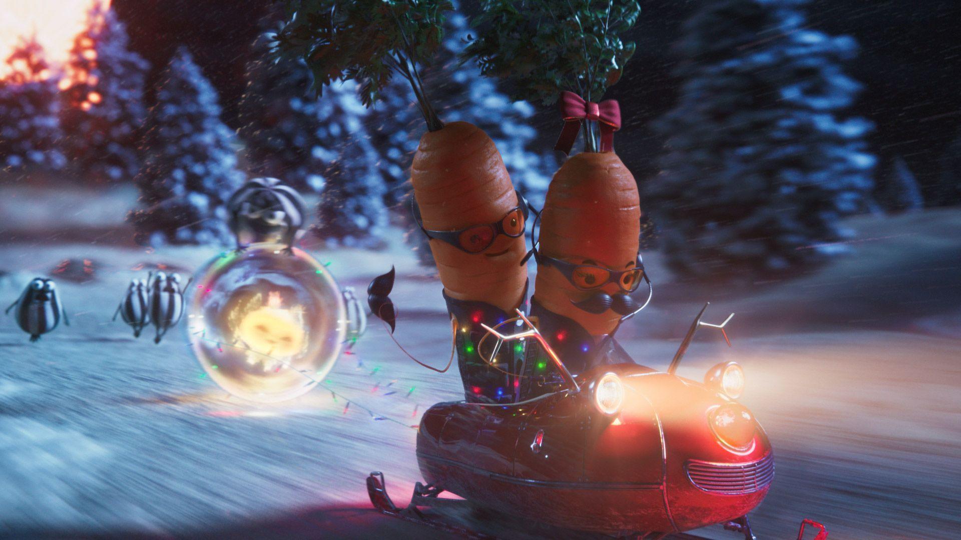 A still from the Aldi Christmas advert, showing two carrots in the snow