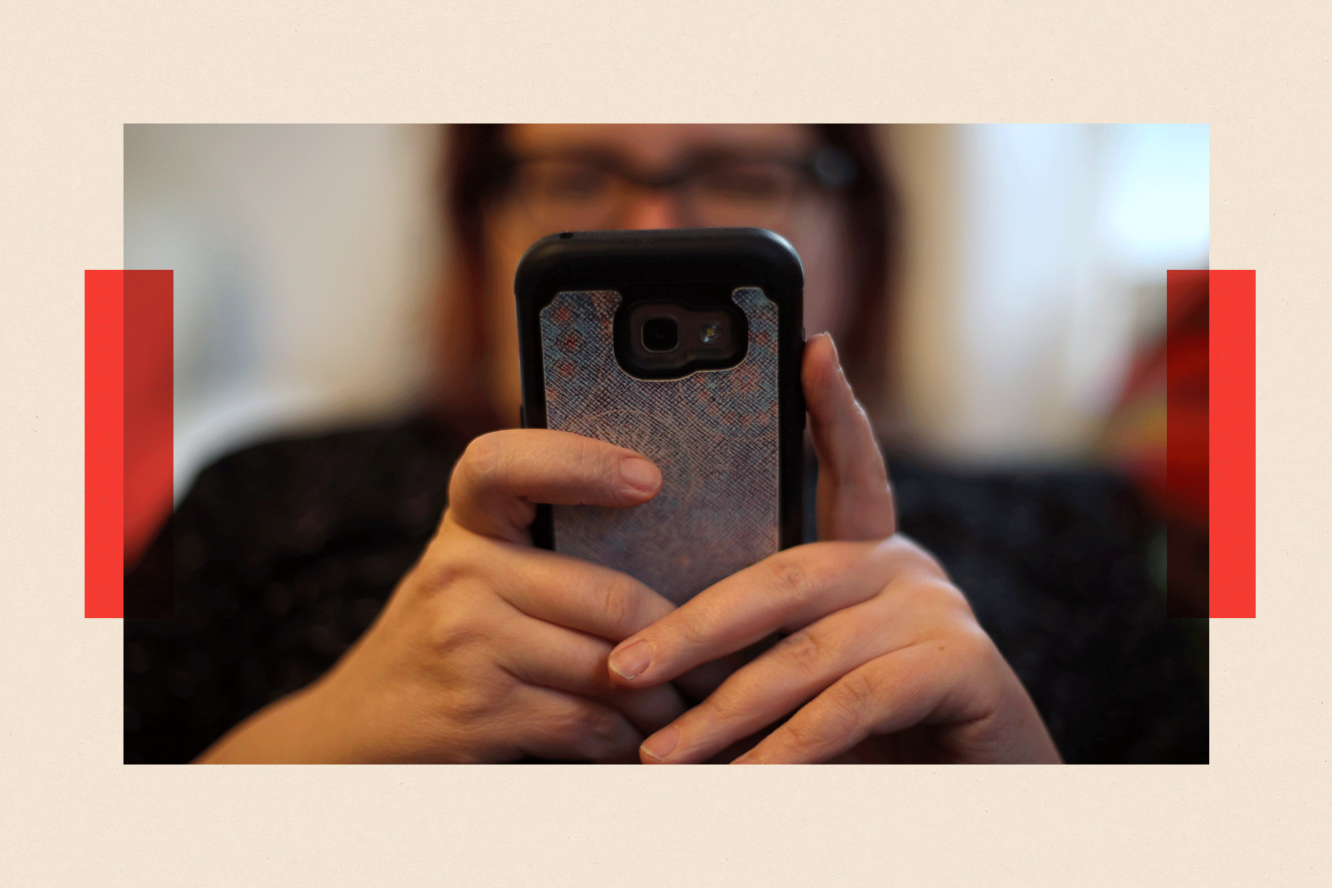 A woman looking at her phone